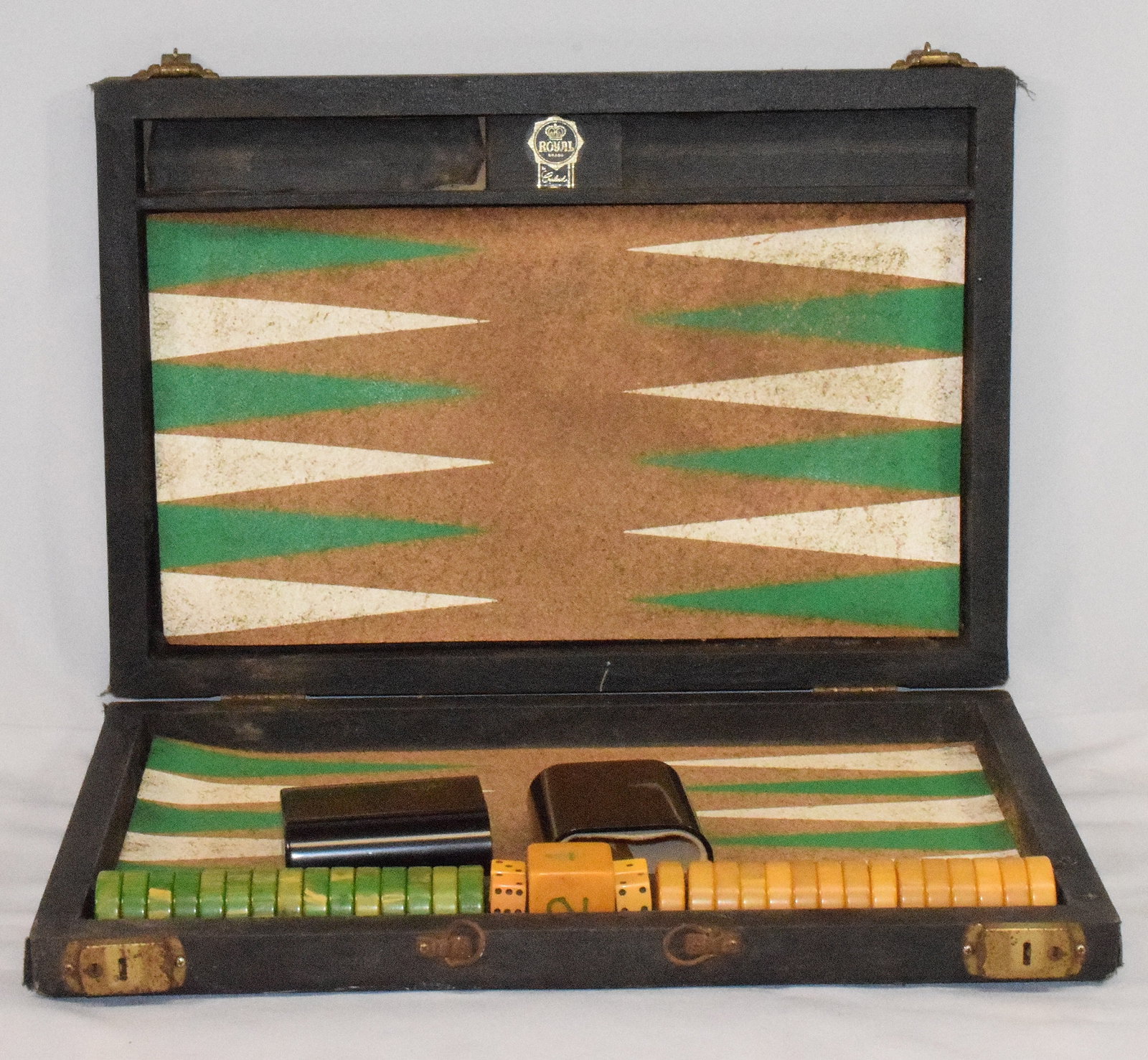 BACKGAMMON MARBLED GREEN & BUTTERSCOTCH & CASE: Vintage Backgammon Bakelite Game. The game pieces are Marbled Green & Butterscotch with dice and two nice leather dice cups. . The game comes in original case, which does have some signs of wear. The