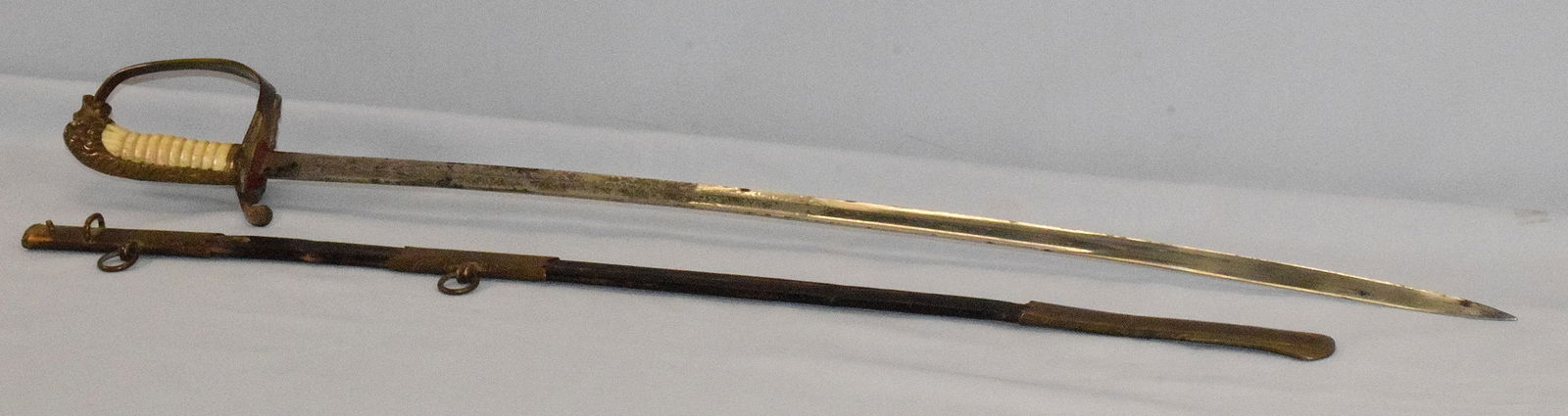 WWI TURKISH GERMAN NAVAL OFFICERS DRESS SWORD: WW1 Period Turkish Naval Officers Full Dress Sword, fine German made example with gilded lion head hilt. Folding guard with anchor and plain back locket to the reverse. Bone grip and missingwrap. Orig
