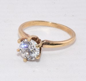 14K GOLD AND ZIRCONIA RING.