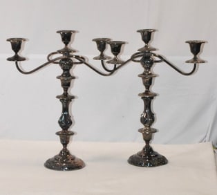 THREE LIGHT SILVERPLATED CANDLESTICKS