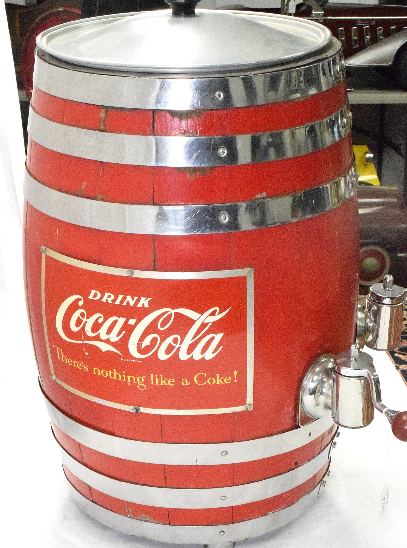 COCA COLA BARREL SODA DISPENSER: Vintage red wooden barrel with chrome straps. Double chrome spigot. Coke barrel sides marked with (2) metal signs "Drink Coca-Cola There's nothing like a Coke!" in white and yellowlettering. Overall d