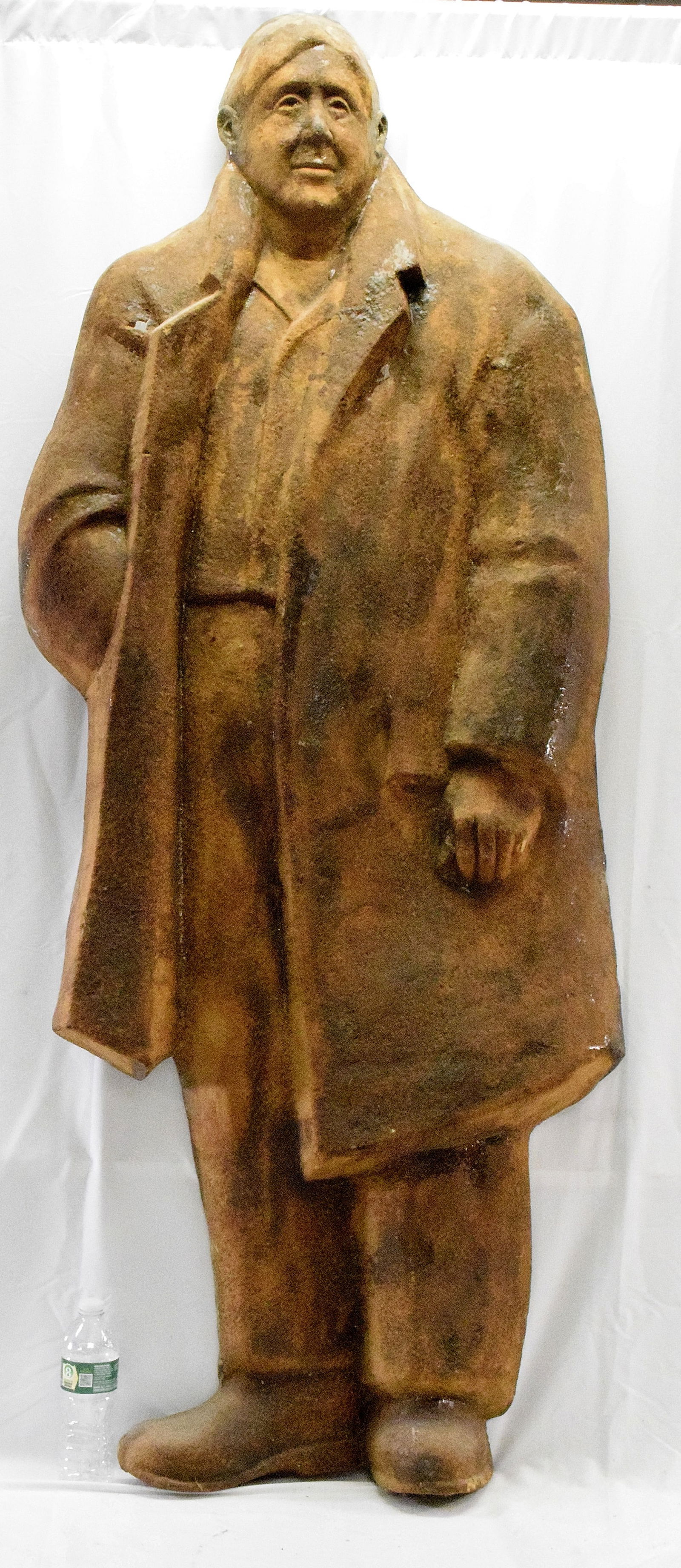 STORE DISPLAY SILHOUETTE FIGURE: Vintage silhouette figure of a man wearing a long jacket, We believe used in store displays. Made of fiberglass, wire in back for hanging, hole in right arm, crack in right side of coat. Goodcondition