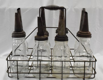 VINTAGE AUTOMOTIVE OIL BOTTLES IN METAL HOLER