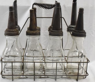 VINTAGE AUTOMOTIVE OIL BOTTLES IN METAL HOLDER