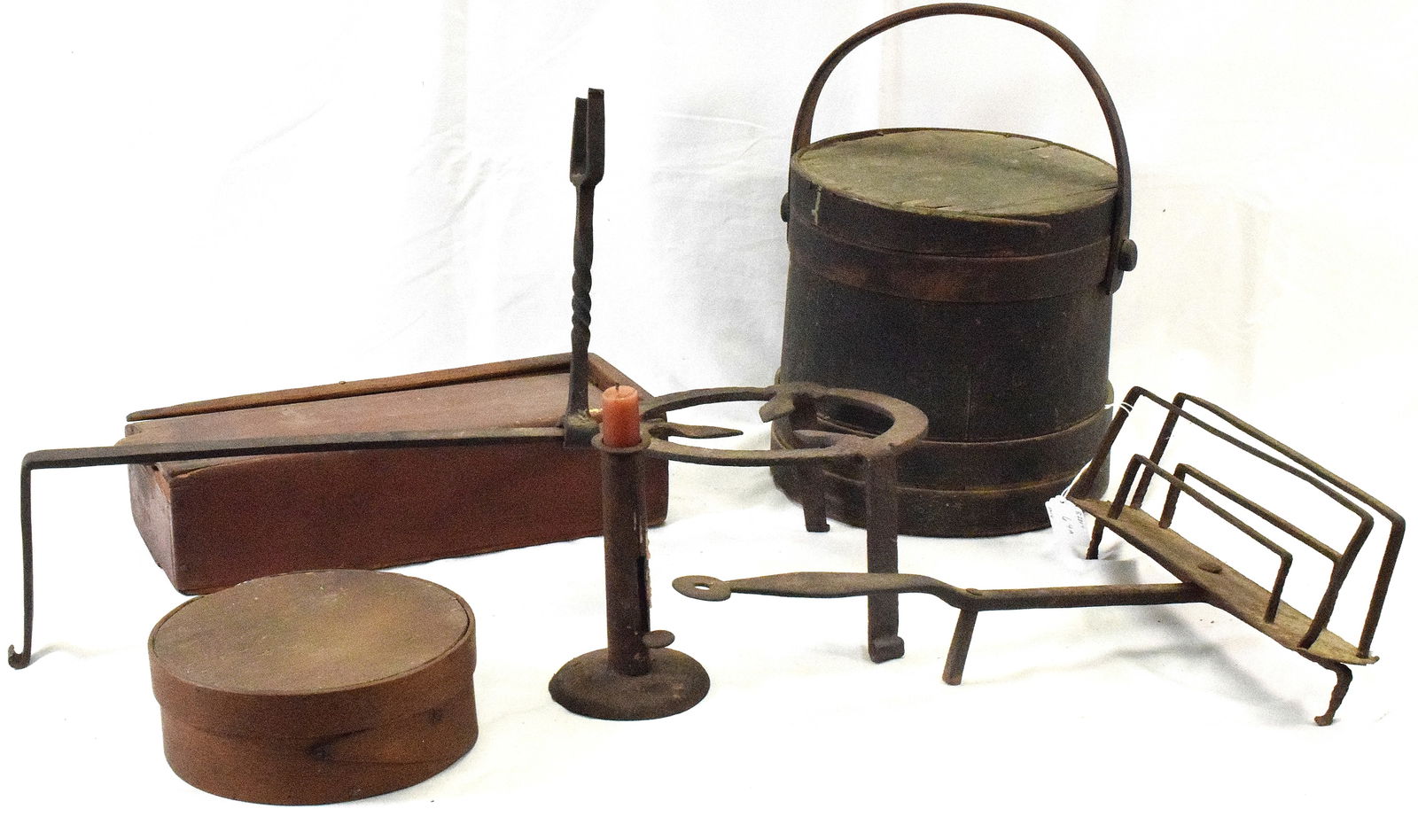 6 ASSEMBLED 18TH/19TH PRIMITIVE COUNTRY ITEMS: Consists of 1) 18th wrought iron fireplace trivet. Good condition. 2) 18th wrought iron fireplace toaster. Some wear and rust. 3) Tin pushup hog scrapper candlestick. Surface rust. 4) Early withthe or