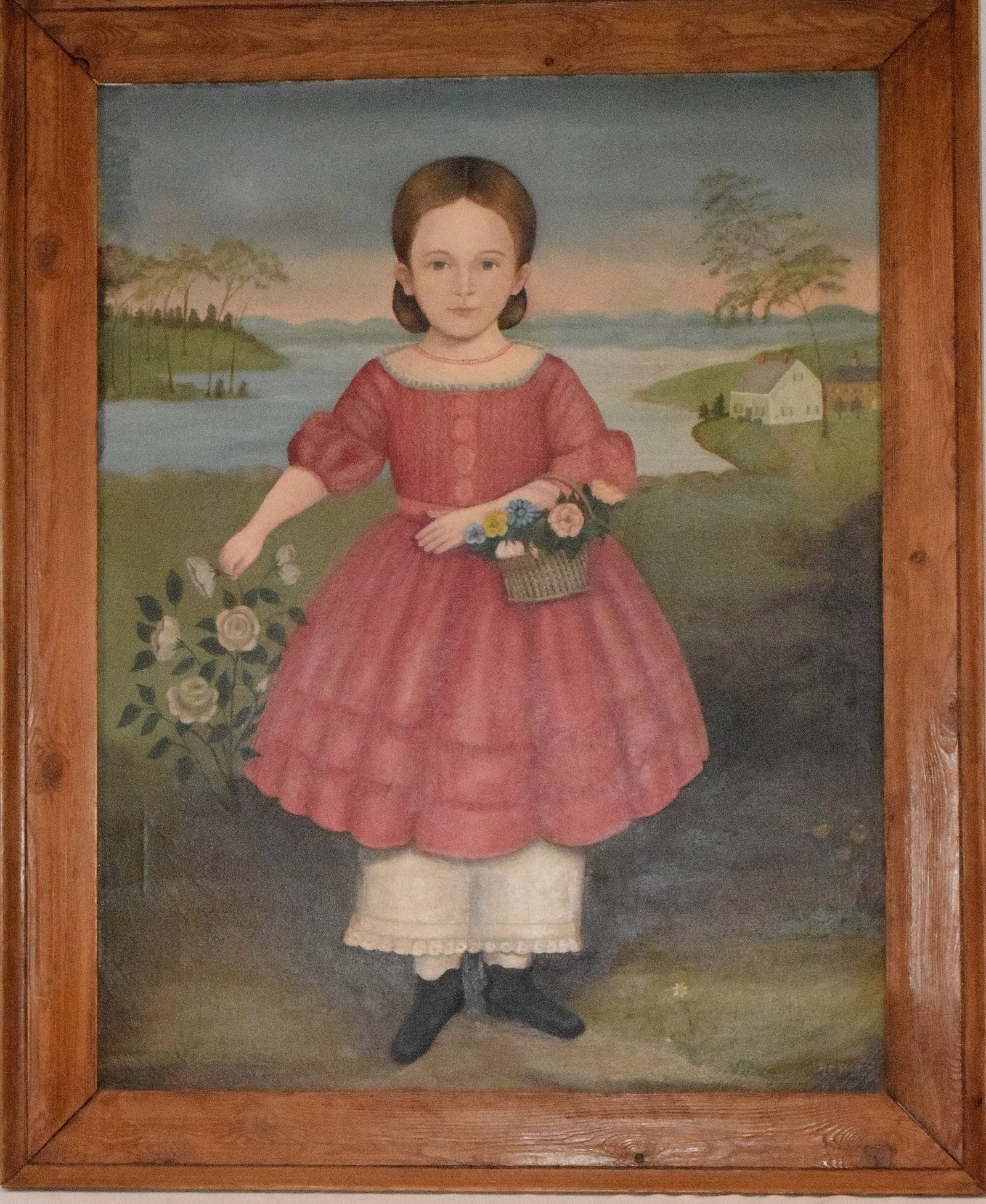 AMERICAN SCHOOL FOLK ART PORTRAIT GIRL LANDSCAPE: Oil on canvas, full-length depiction of a youthful girl wearing rose Empire-style dress, white pantaloons, black shoes, and having in both arms with flowers. Pond or lake in background. Signed lower r