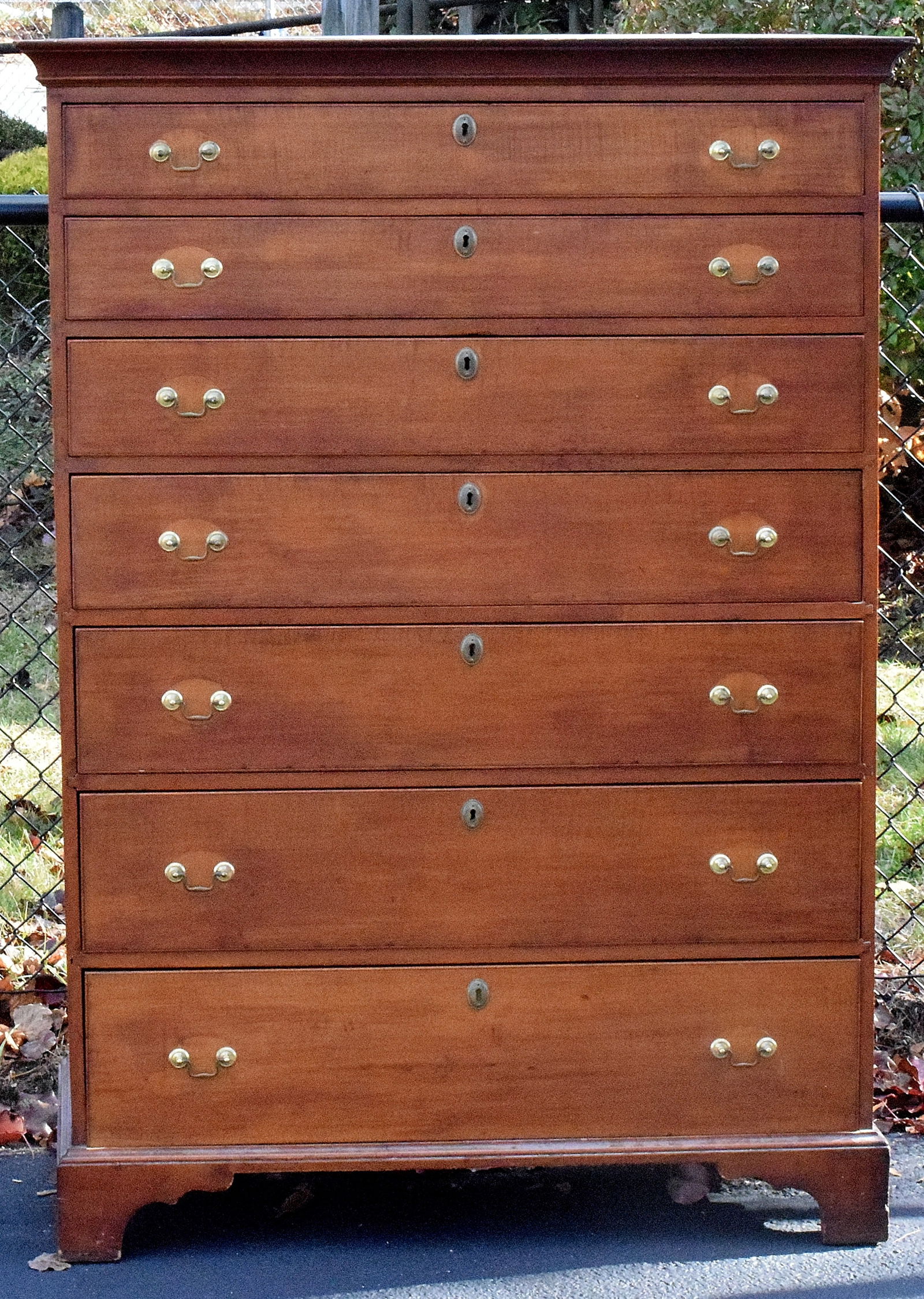 18TH CENTURY CHIPPENDALE MAPLE CHEST 7 DRAWER: American chippendale maple tall chest, New England, 1780's period, 7 graduated drawers, tiger maple. Secondary wood is pine, bracket base, feet are original. Pulls have been changed from theiroriginal