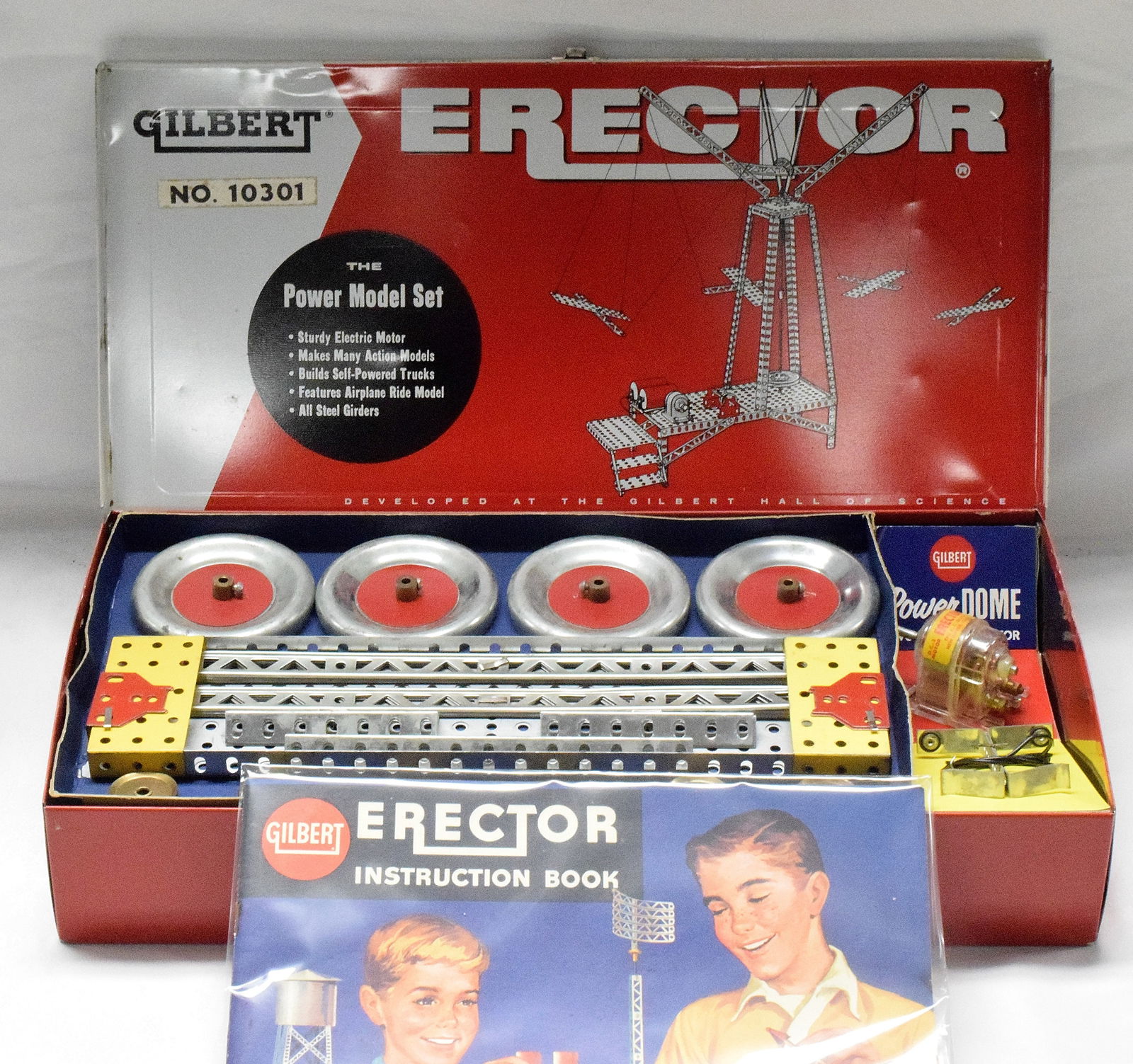 ERECTOR SET #10301 POWER MODEL: The Power Model erector set #10301 American science series, made by the Gilbert company. Metallic box, American flag design on box, litho cover. Good condition. L: 16 1/4in, W: 8 1/4in, H: 3in. Weight