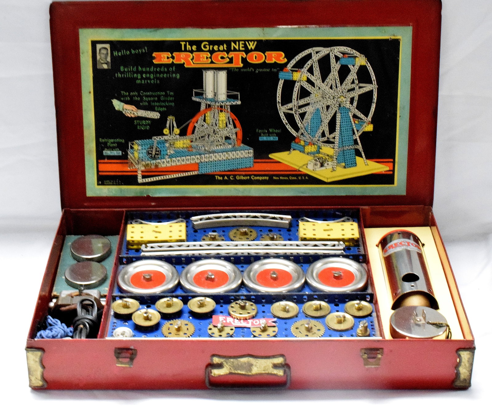 ERECTOR SET #8 1/2 GREAT NEW ERECTOR: Set #8 1/2, The Great New Erector set, made by The A.C Gilbert Company in 1937. Red metal box, reproduction inserts, does not have manual. Good condition. L: 21 1/4in, W: 12in, H: 3in, Weight:17 lbs.