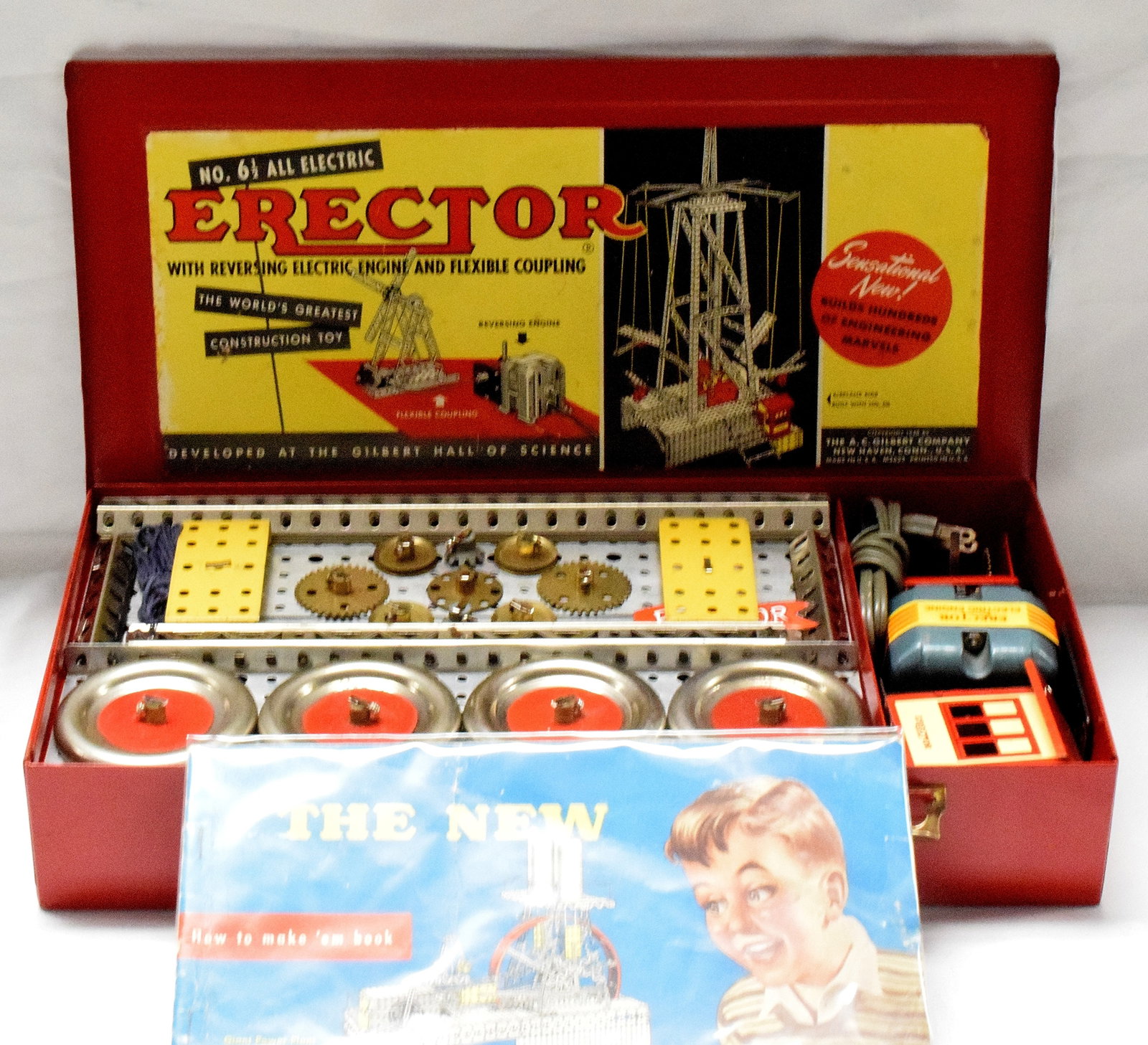 ERECTOR SET #6 1/2 ALL-ELECTRIC: Erector set #6 1/2, "The sensational No. 6 1/2" made by the A.C Gilbert Company in 1948. Red metal box, repainted outside of box, reproduction lid label. Builds various models. Good condition. L:16 1/