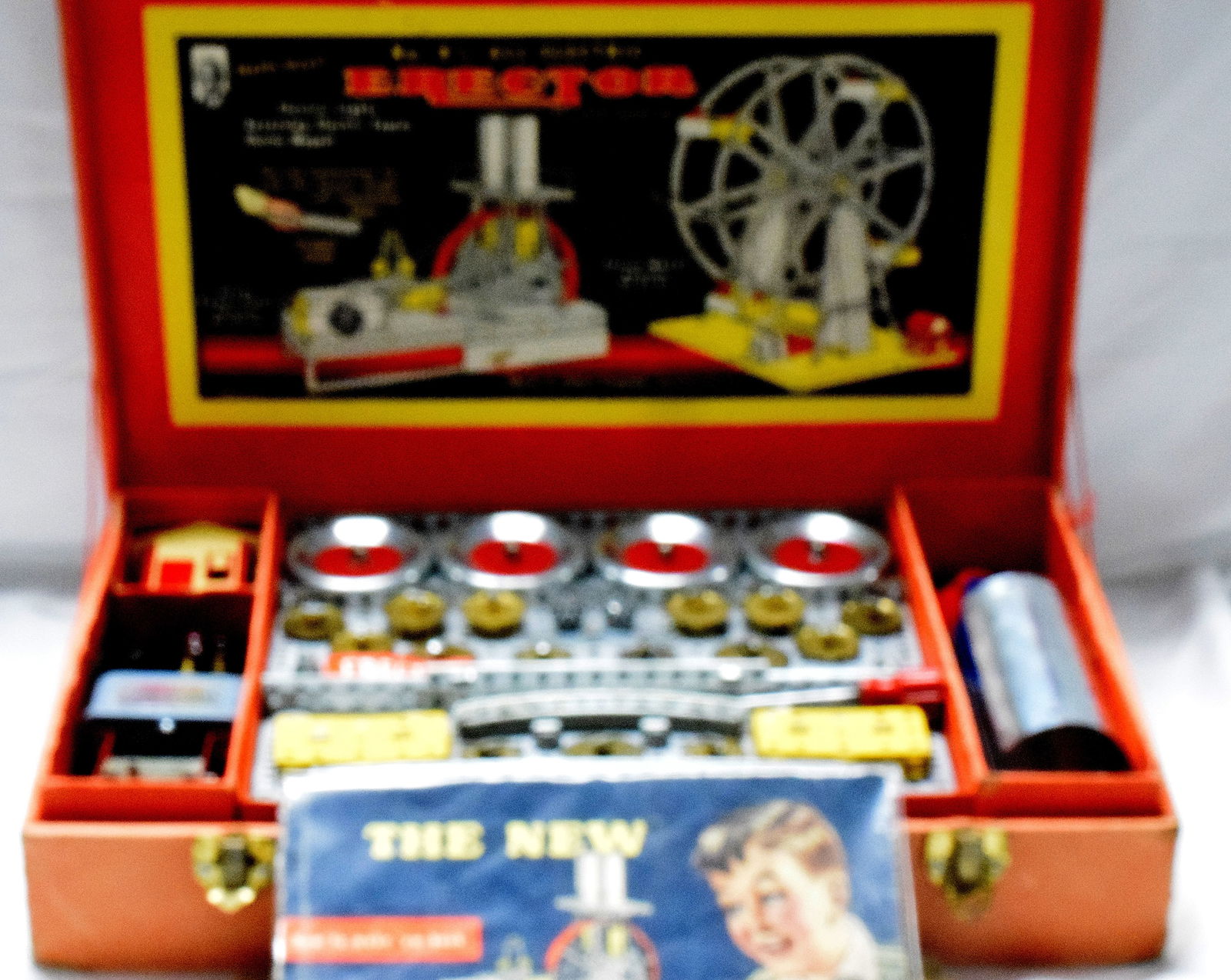 ERECTOR SET #8 1/2 ALL-ELECTRIC: Complete erector set #8, The All-Electric, made by A.C Gilbert Company. Red heavy cardboard box, builds ferris wheel model. Good condition. L: 20in, W: 12in, H: 4in, Weight: 14lbs