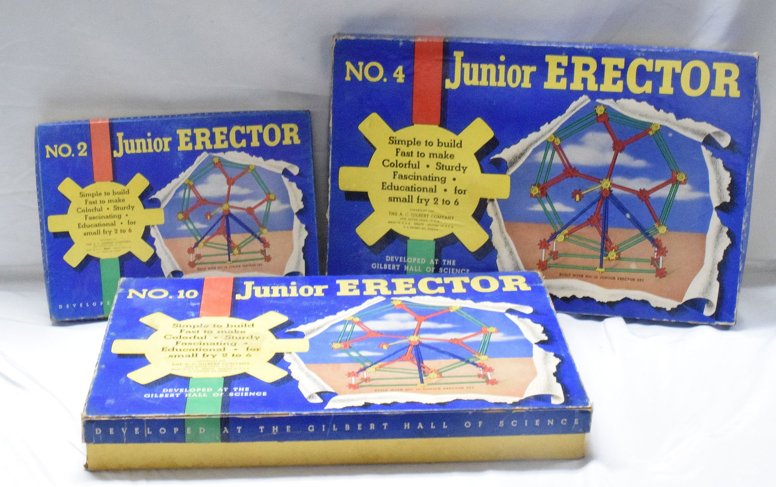 3 JUNIOR ERECTOR SETS: (1) No.2 complete junior erector set (2) No.4 complete junior erector set, slight tear in cover (3) No.10 complete junior erector set. Sets are made by the Gilbert company. All good condition.L: 20 1/