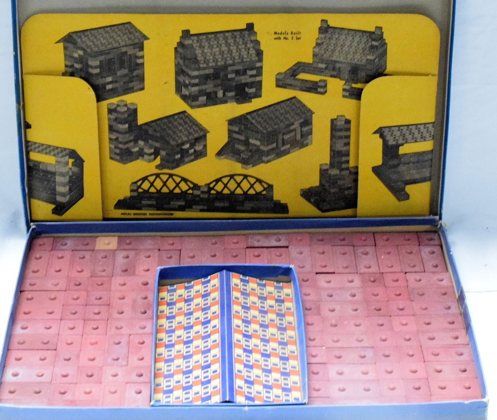 ERECTOR BRICK SET #1: Complete brick erector set #1, made by A.C Gilbert Company, in 1944. Silver colored cardboard box. Good condition. L: 15 1/2in, W: 10 1/2in, H: 1 1/2in, Weight: 3 lbs.