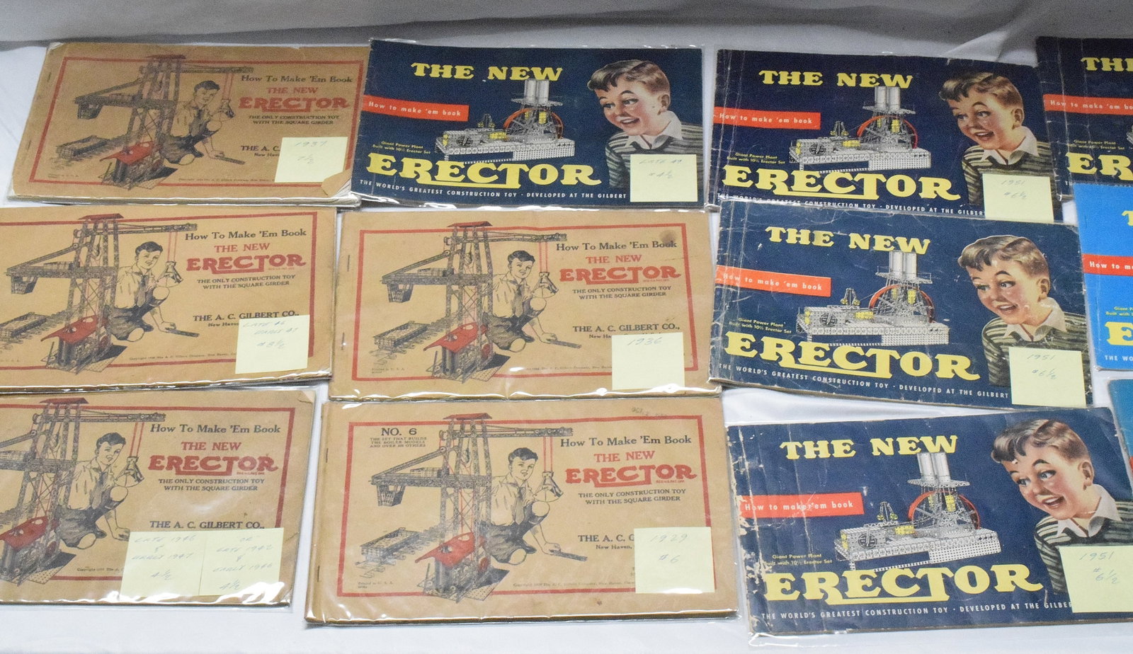 33 A C GILBERT ERECTOR SET MANUALS &1 REPRO: Each in sleeves. Each identified by date and erector set numbers. 11 x 7 inches x 4 inches tall for all the manuels. Various condition. But are good good.
