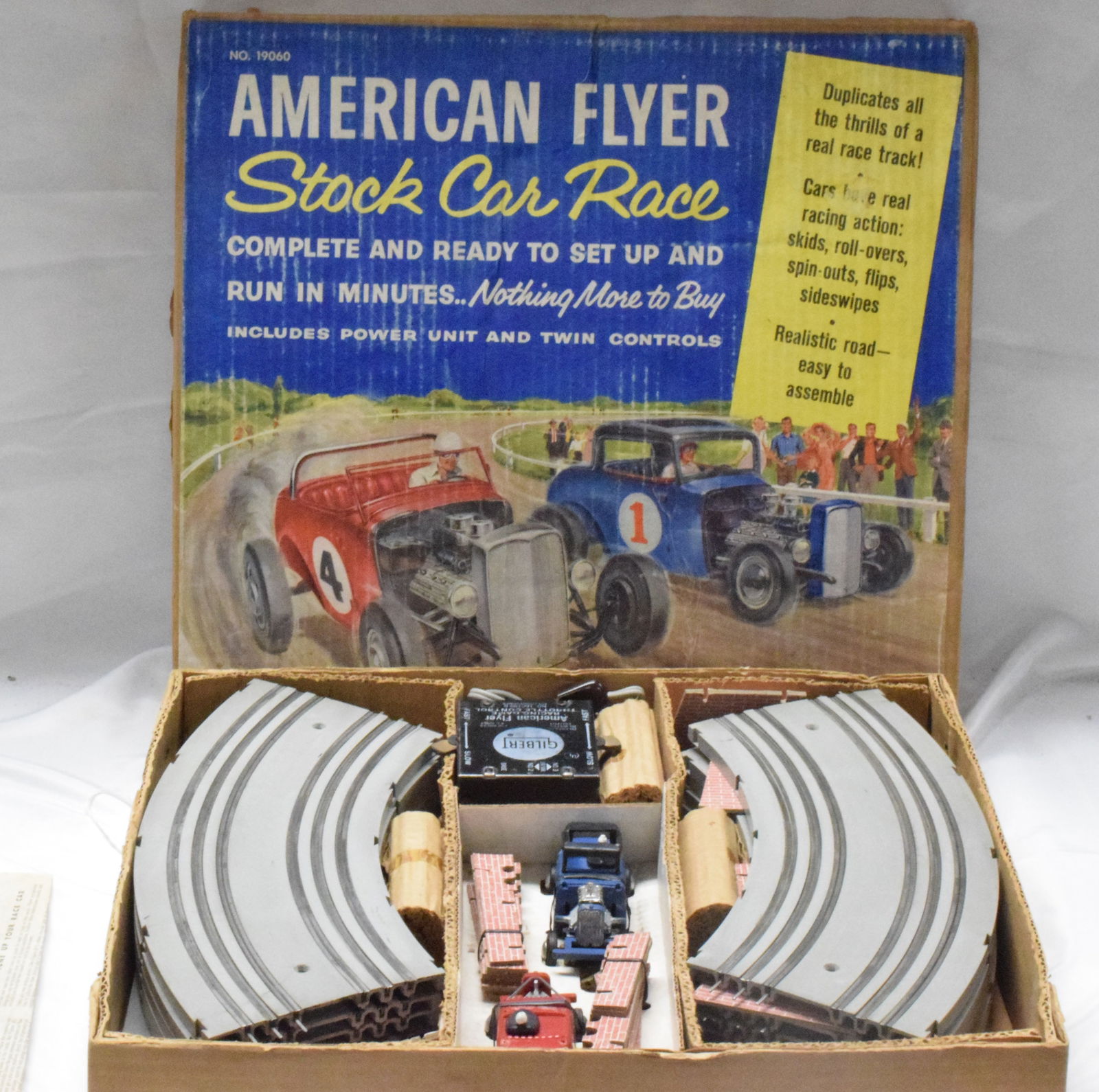 STOCK CAR RACE SET: Gilbert American Flyer stock car race set #19060, made in 1960's. Complete set in box, tears to instructions. Good condition. L: 18in, W: 16 1/4in, H: 2 3/4in, Weight: 11 lbs.