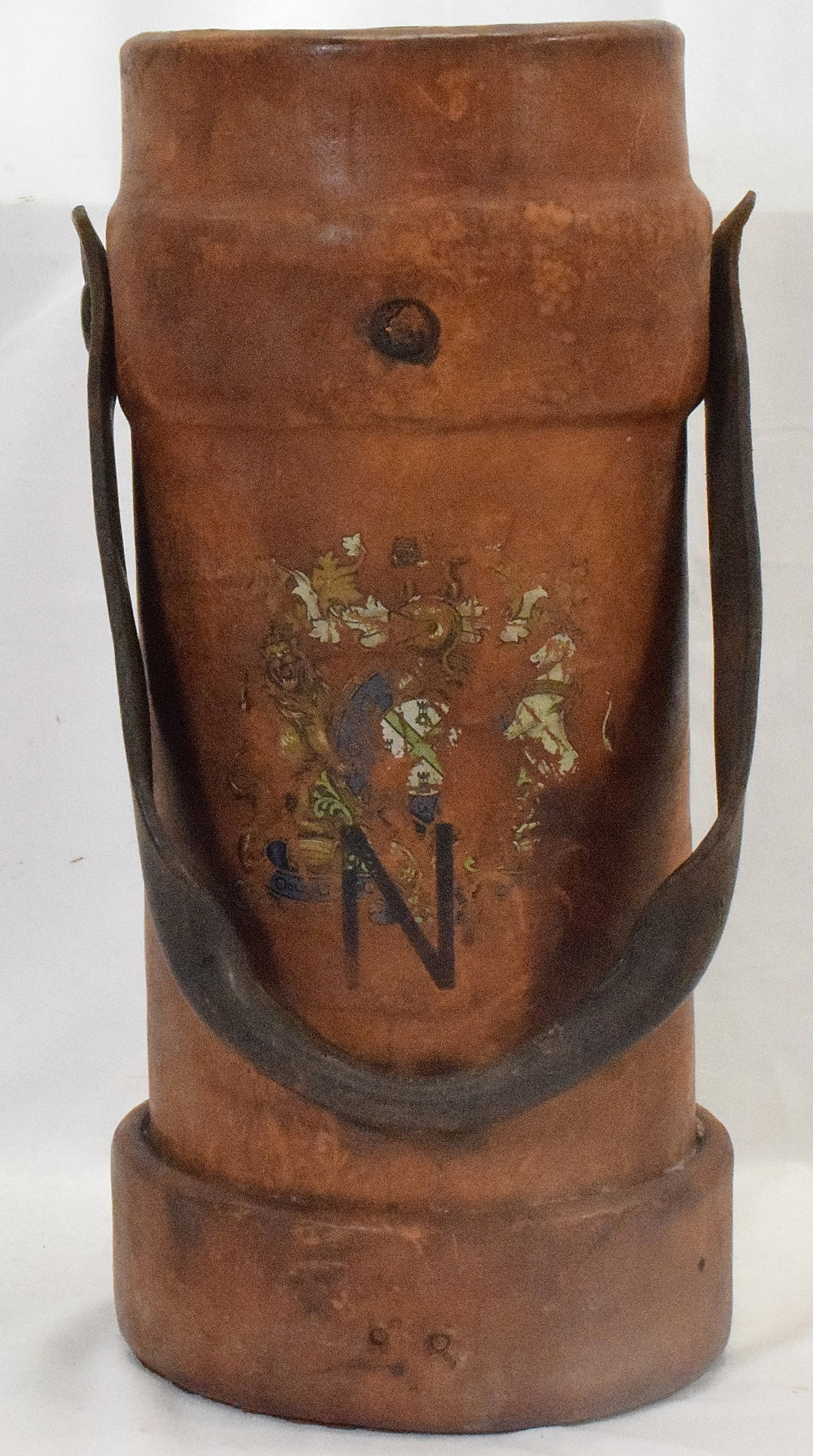 ENGLISH NAVY ARTILLERY SHOT BUCKET: British Royal Navy artillery bucket. Royal crest paint. Wear to crest painting. N for Navy. leather bucket 16 inches tall. Canvas Lined interior. Numbered and marked on base. Separation on backseam. L