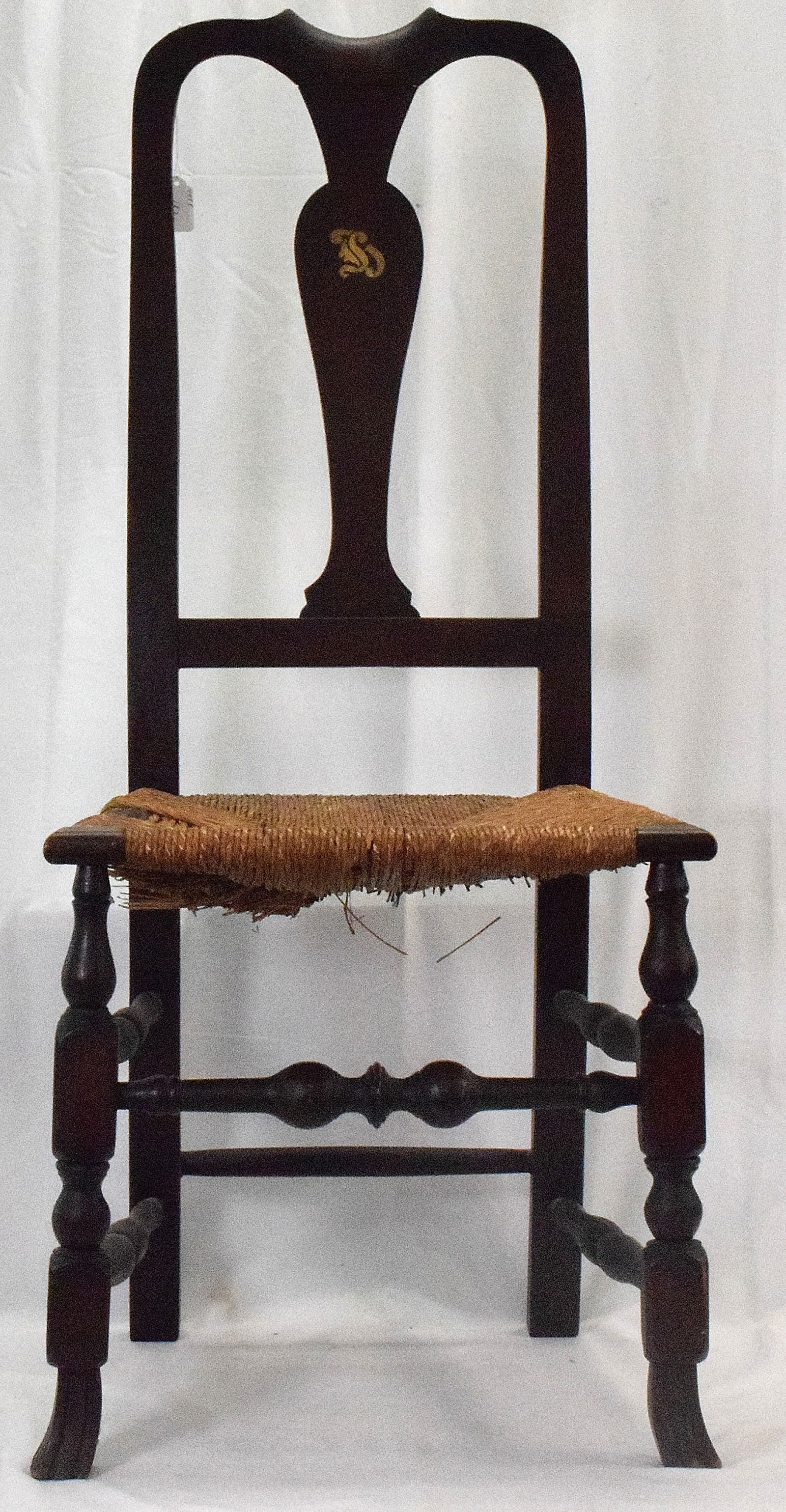 19TH NEW ENGLAND QUEEN ANNE SIDE CHAIR: New England 19th Century. Queen Anne style side chair. Splat backs Rush seat. Turned legs connected by a turned stretcher. Carved Spanish feet. Height of back 42 1/2". Seat height 18".Some damage of r