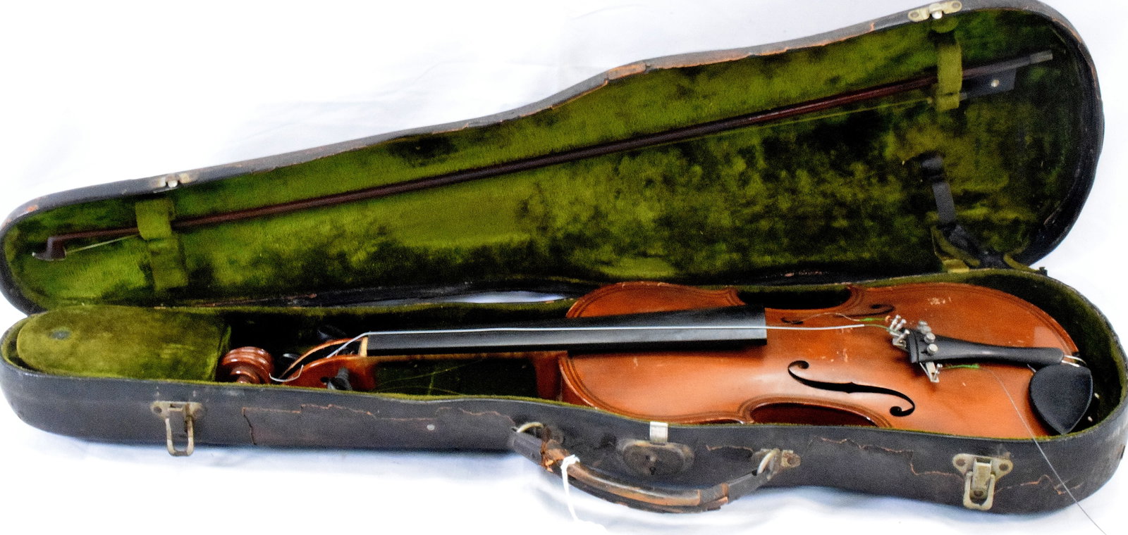 GIOVANNI PALOL MAGGINI VIOLIN & VUILLAUME BOW: Late 19th or early 20th century German violin after Giovanni Poalo Maggini in hard shell case. Violin maple with birdseye maple two back and sides. Paper label inside. Copy of Magginimanufactured in S