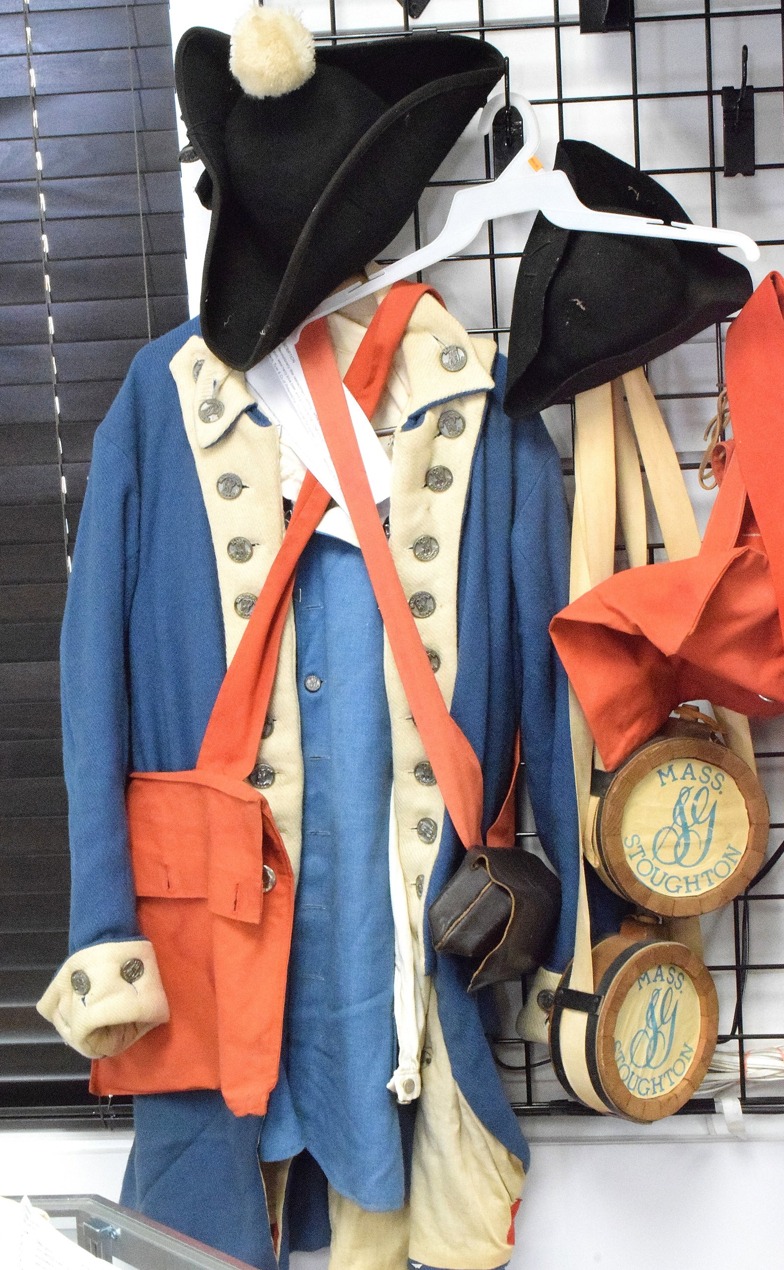 1976 STOUGHTON MASS REVOLUTIONARY RE-ENCAT UNIFORM: 1976 bicentennial re-enactment. uniform and accessories. Including tri corner hats, cartridge pouches, waistcoat, pants, shirt, canteens, and etc. Vintage pictures show the men in theiruniforms. This 