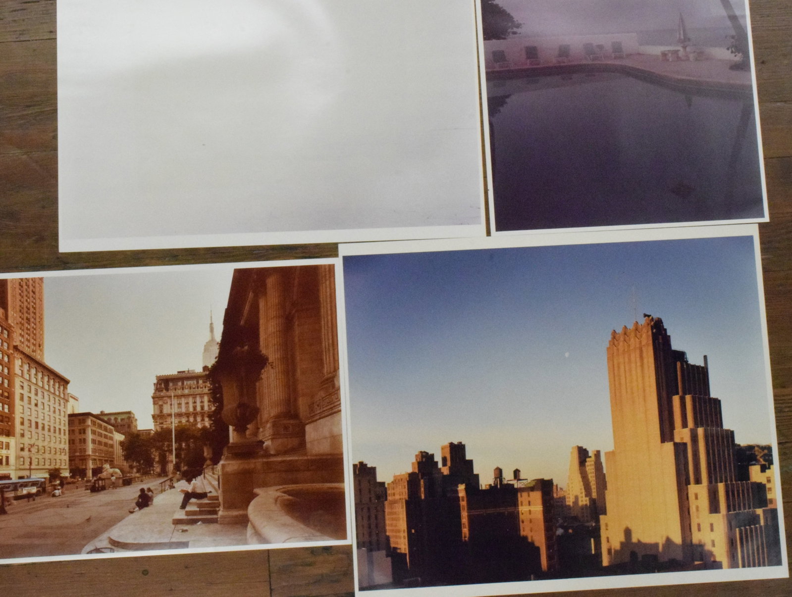 4 JOEL MEYEROWITZ (B-1939) COLORED PHOTOGRAPHS: 4 assorted photographs by Joel Meyerowitz (American born 1938). 1) Dated 1990 and signed. Titled New York City. Large photograph. Unframed. Sheet 20 inches x 24 inches. Good condition. 2)Titled Bay si