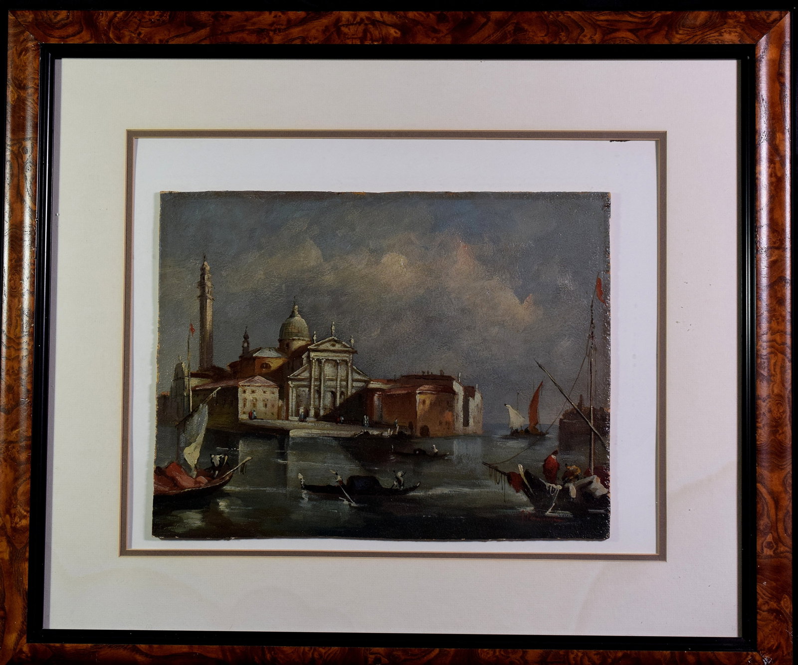 ITALIAN SCHOOL OIL ON CANVAS VENICE GRAND CANAL: Venetian School oil on board. Scene of Grand Canal and Church of Santa Maria della Salut. Ca 19th/20th century. Signed in red lower right. Image measures 10 1/4 x 15 1/2. Framed 18 inches x 23 inches.
