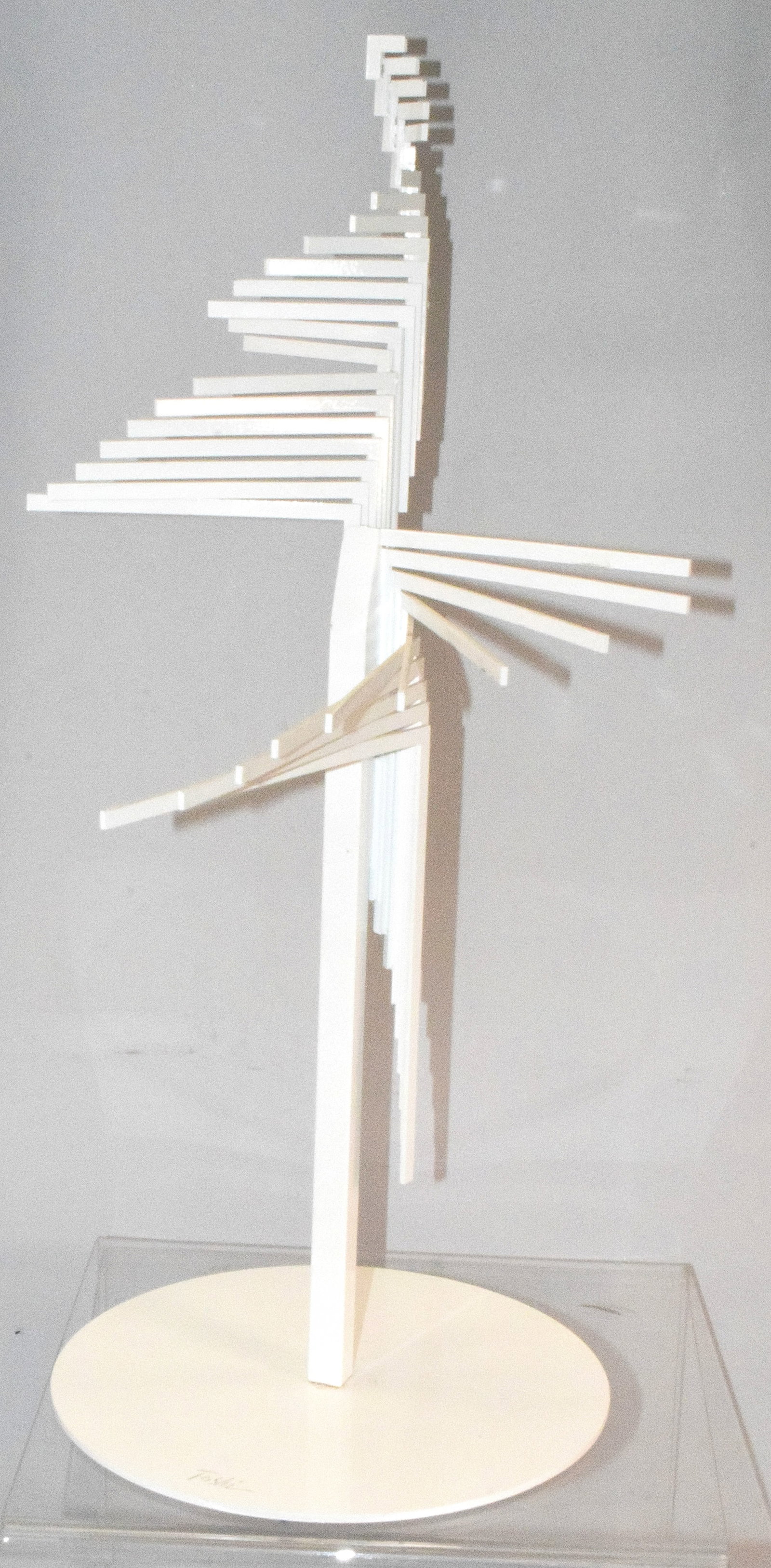 TOSHI MODERN ABSTRACT SCULPTURE: Signed Toshi abstract sculpture. Design with stand with central axis with numerous slender elements radiate outwards and upwards. Kinetic visual effect. Enamel white. 21 inches tall x approx 9inches a
