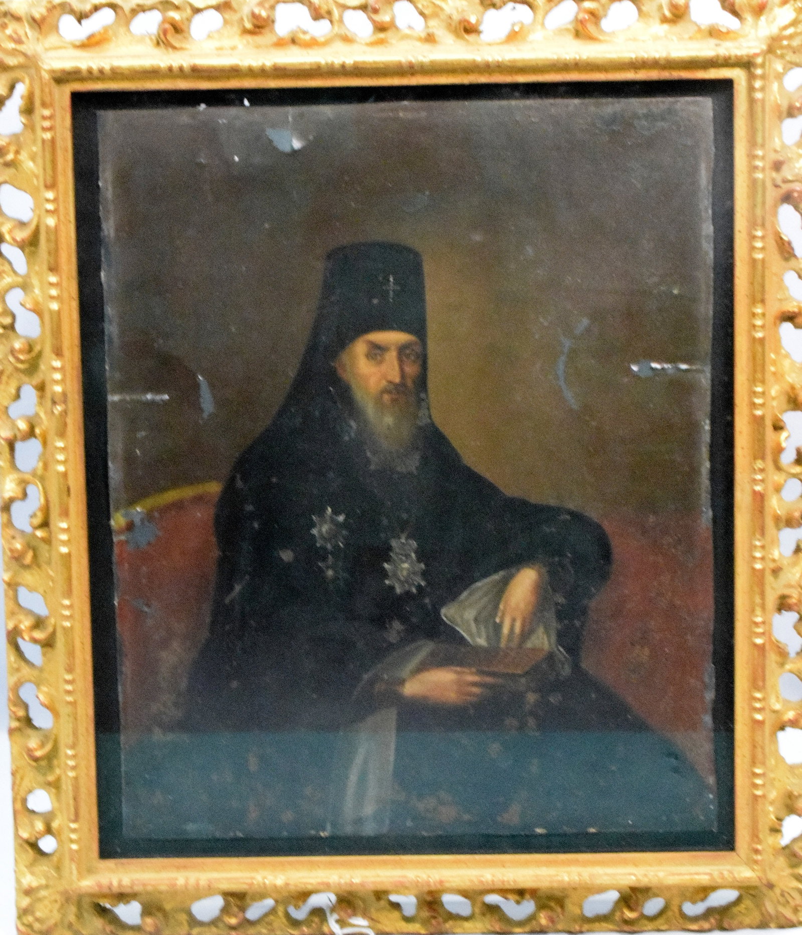19TH PORTRAIT PAINTING ST IGNATIUS BRIANCHANINOV: Painting on tin. 19th century Russian Orthodox Bishop and theologian. Image 12 1/4 inches x 10 1/2 inches. Framed under glass. Some paint loss and surface wear. Frame 14 inches x 13 1/2 inches.