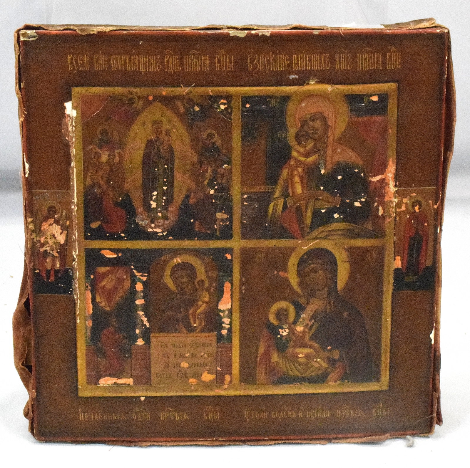 18th/19th ICON WOOD PANEL: 18th/19th century. Icon wood panel with four parts. "Glorification of Our lady"Depicting four different venerated images of the Mother of god. Translation "Source of Life", "Unexpected Joy","Madonna o