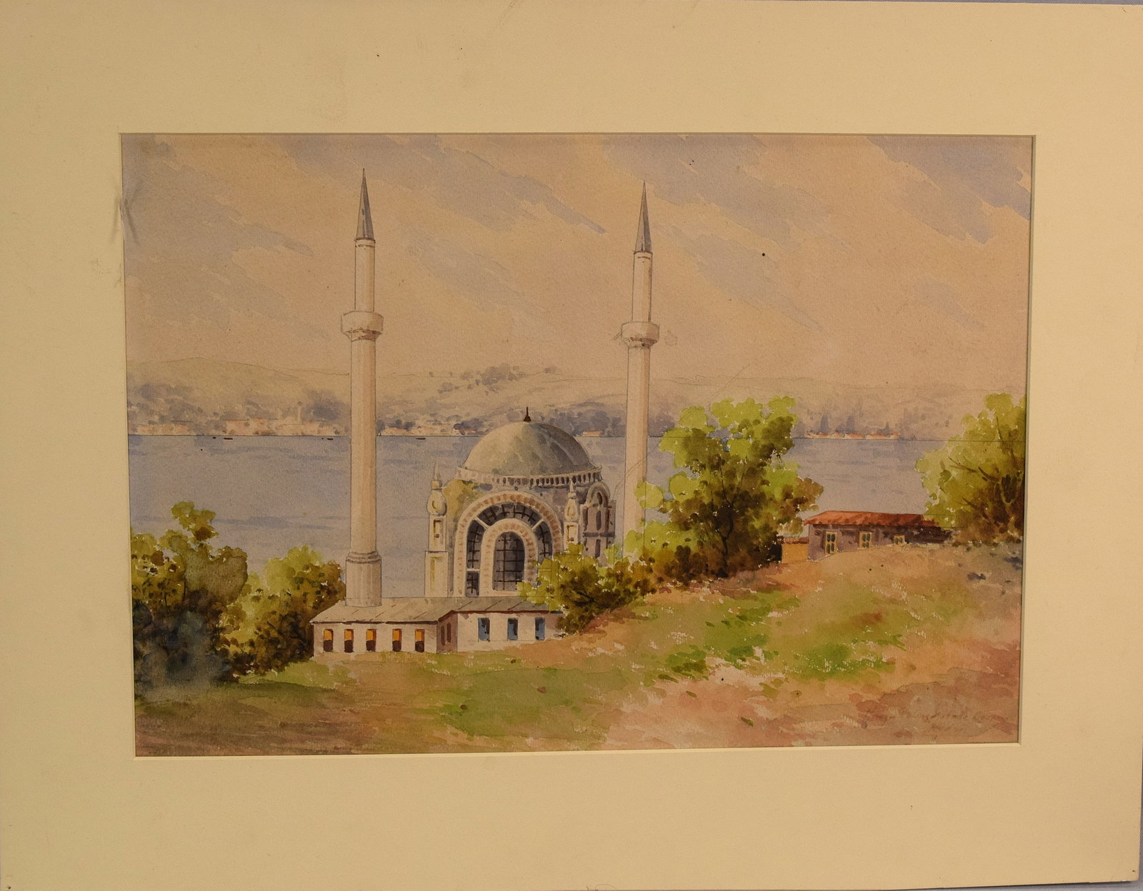 WATERCOLOR PAINTING DOLMABAHCE MOSQUE: Ca 19th/20th watercolor painting on paper. not signed. Depicts the Dolmabahce in Istanbul Turkey. Image 9 1/2 inches x 13 1/2 inches. Matted, but not framed. Good condition. The Estate of Nicholas