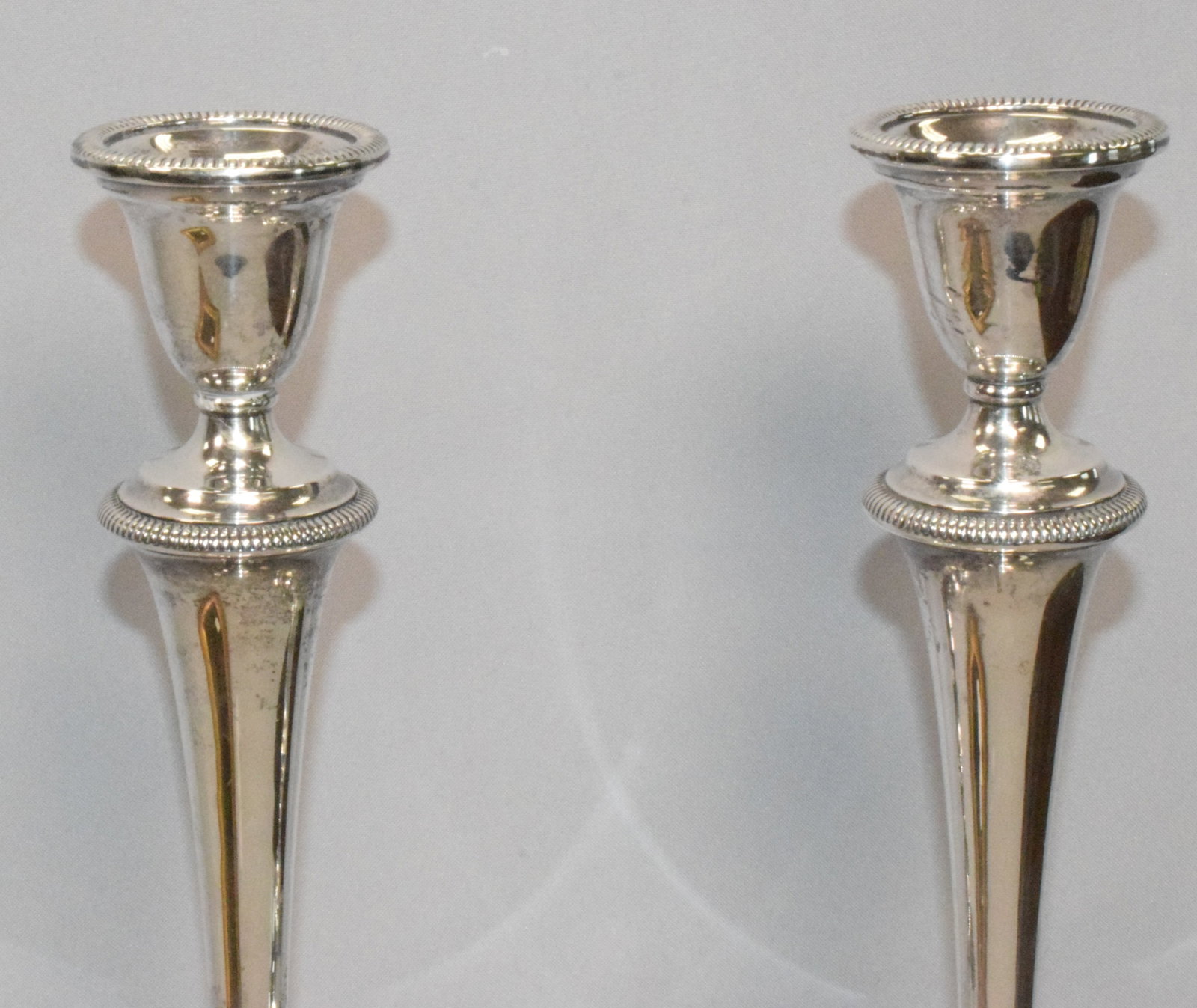 PAIR WEIGHTED STERLING SILVER CANDLESTICKS - 4