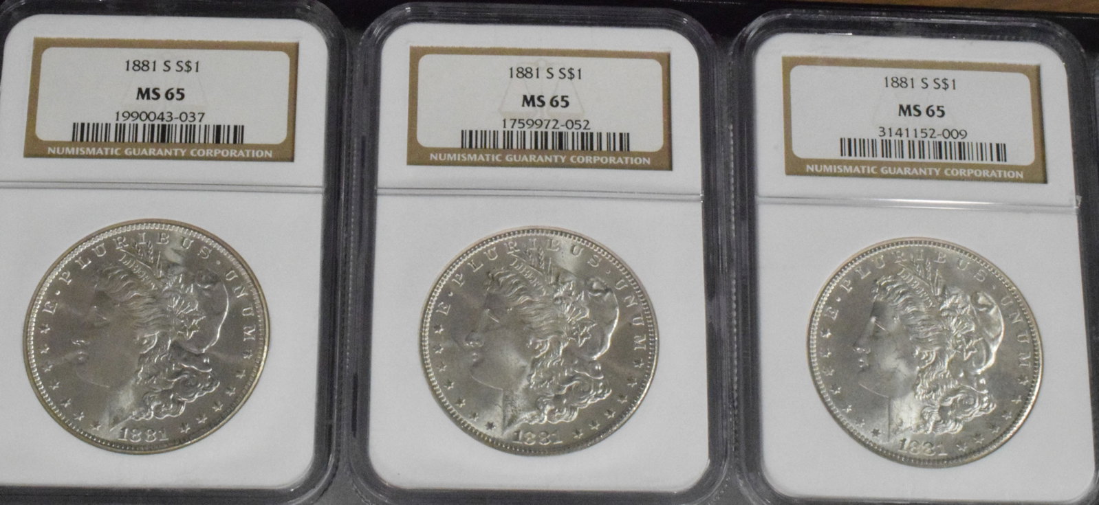 56 GRADED US SILVER MORGAN DOLLARS 1881s - 10