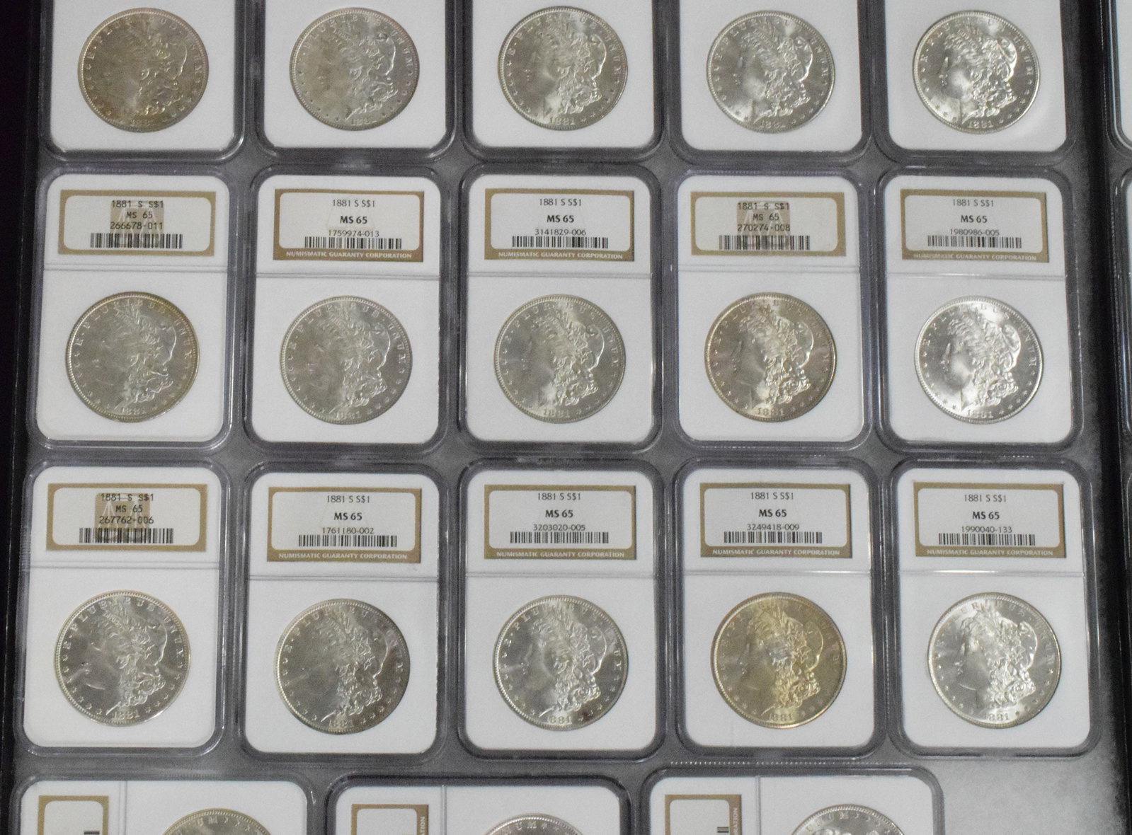 56 GRADED US SILVER MORGAN DOLLARS 1881s - 11