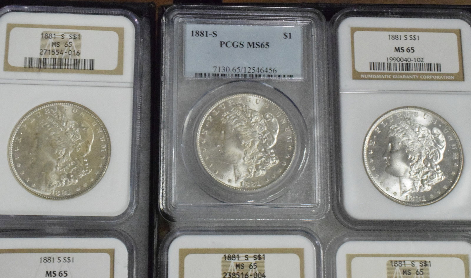 56 GRADED US SILVER MORGAN DOLLARS 1881s - 14