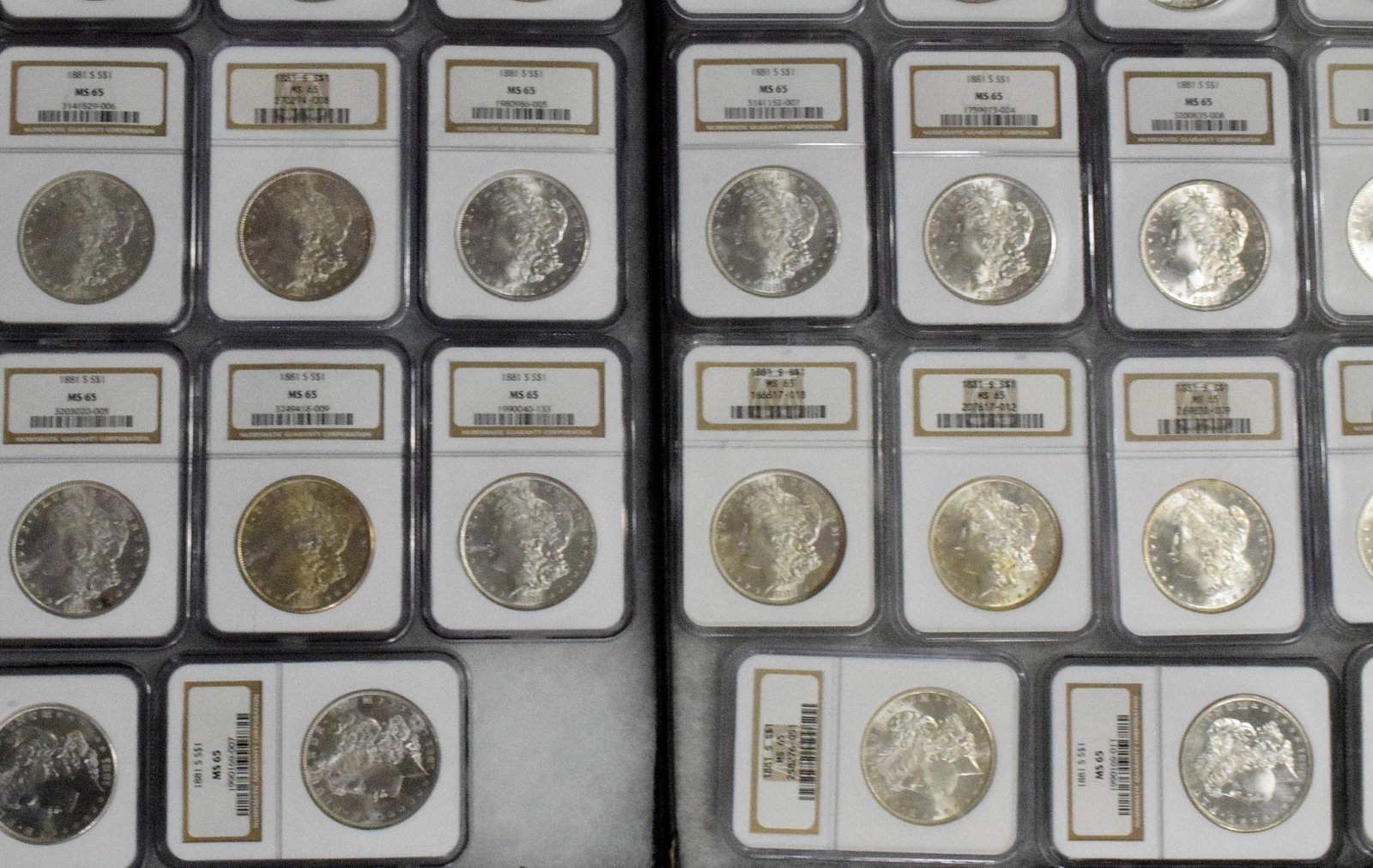 56 GRADED US SILVER MORGAN DOLLARS 1881s - 15