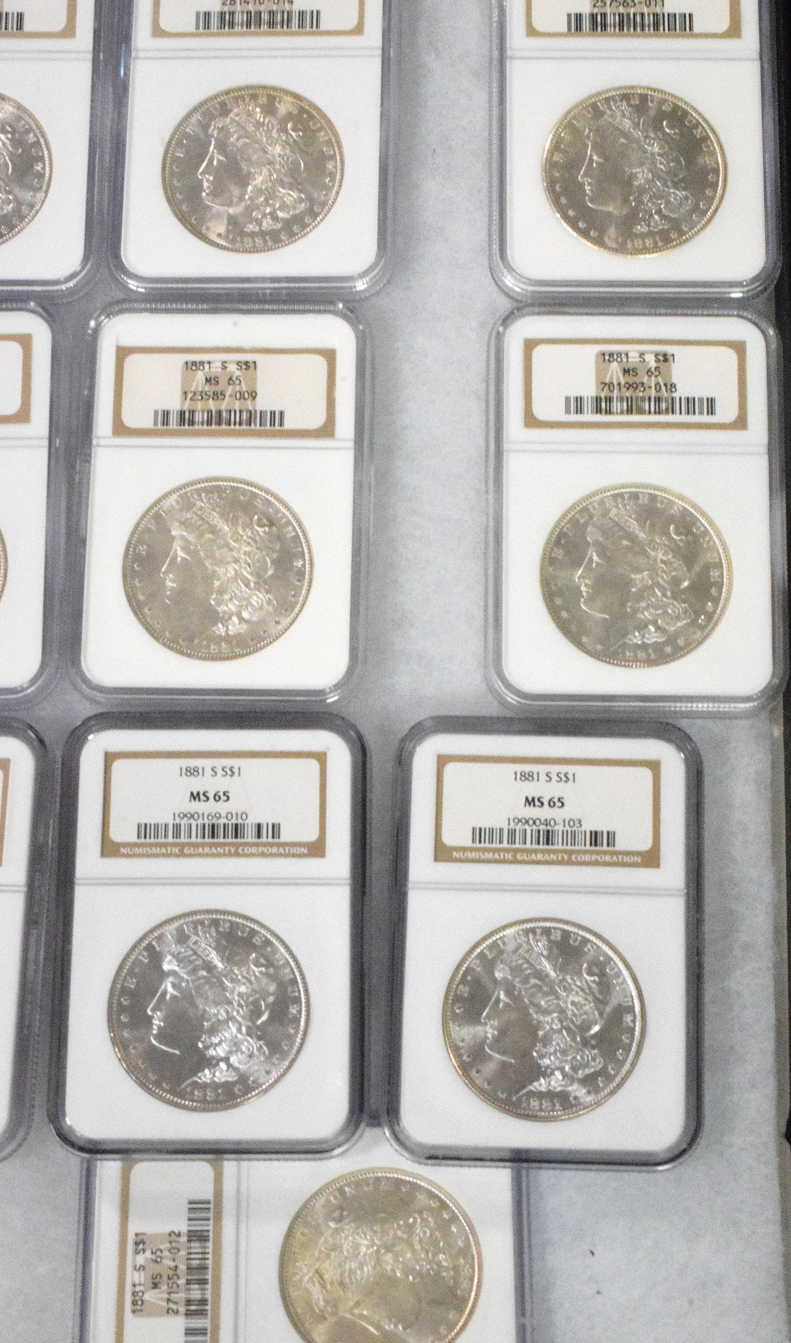 56 GRADED US SILVER MORGAN DOLLARS 1881s - 16
