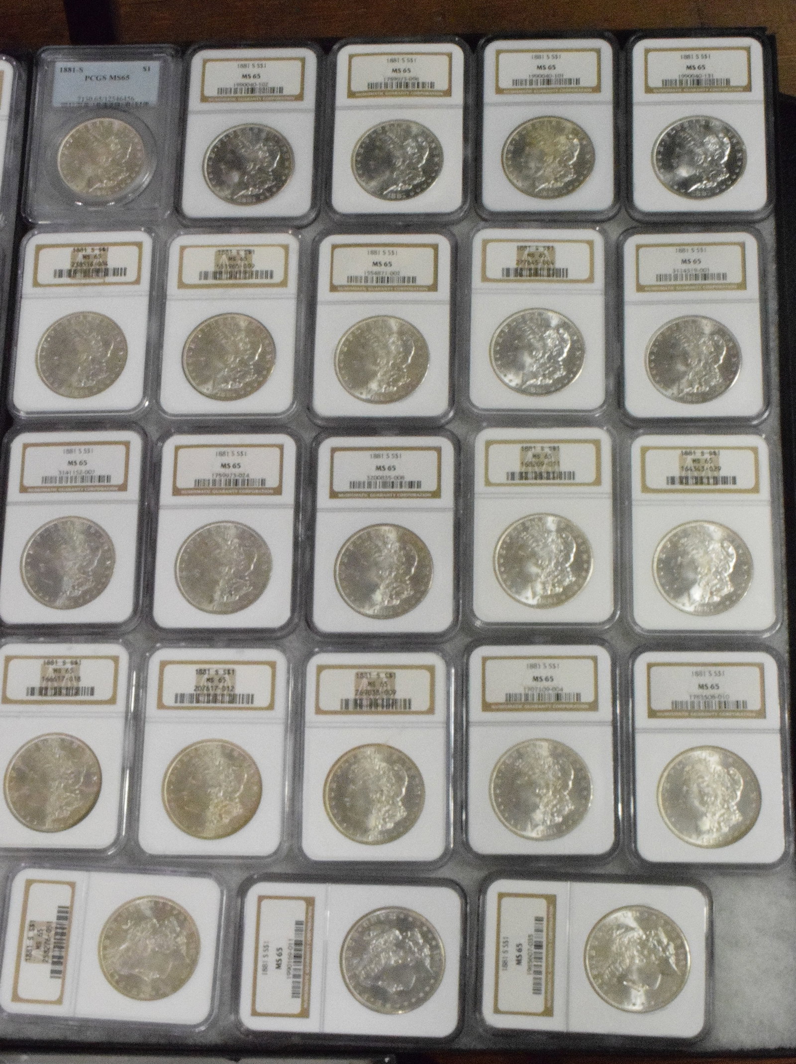 56 GRADED US SILVER MORGAN DOLLARS 1881s - 3
