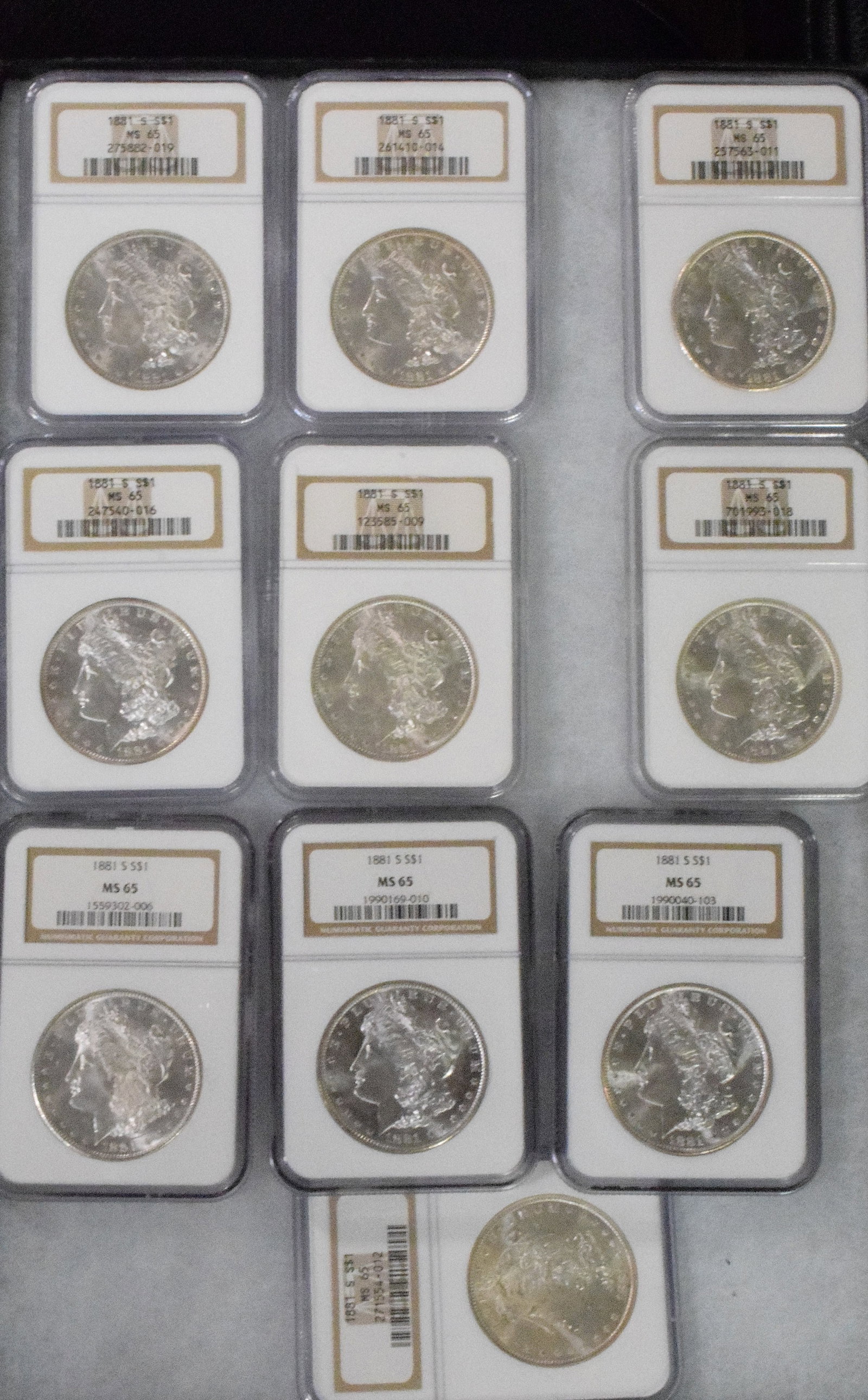 56 GRADED US SILVER MORGAN DOLLARS 1881s - 4