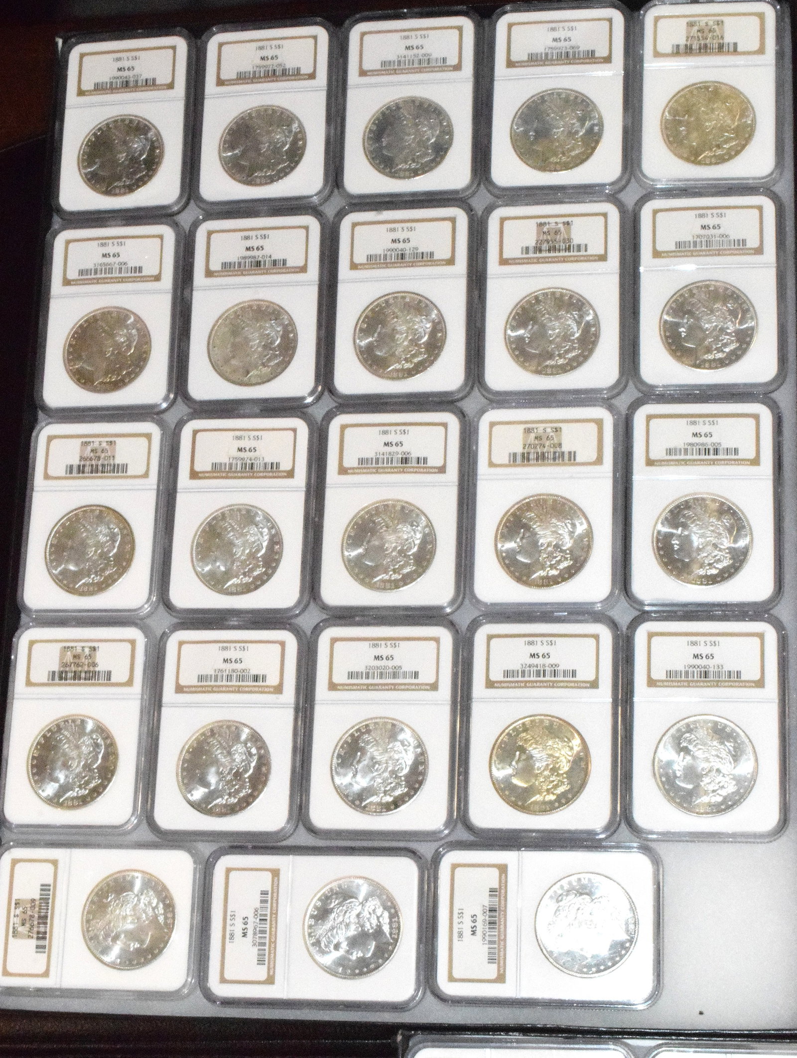 56 GRADED US SILVER MORGAN DOLLARS 1881s - 6