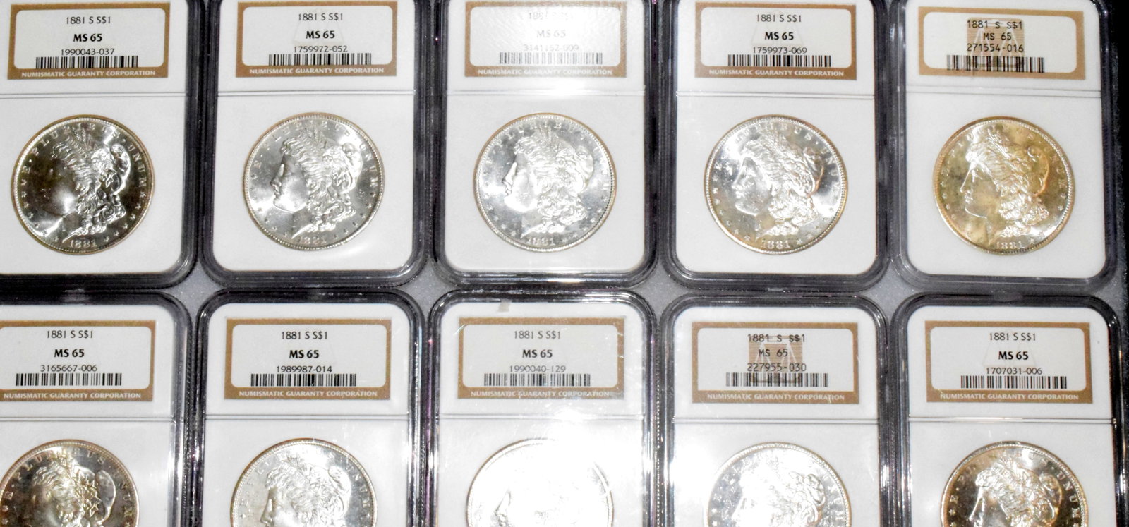 56 GRADED US SILVER MORGAN DOLLARS 1881s - 8