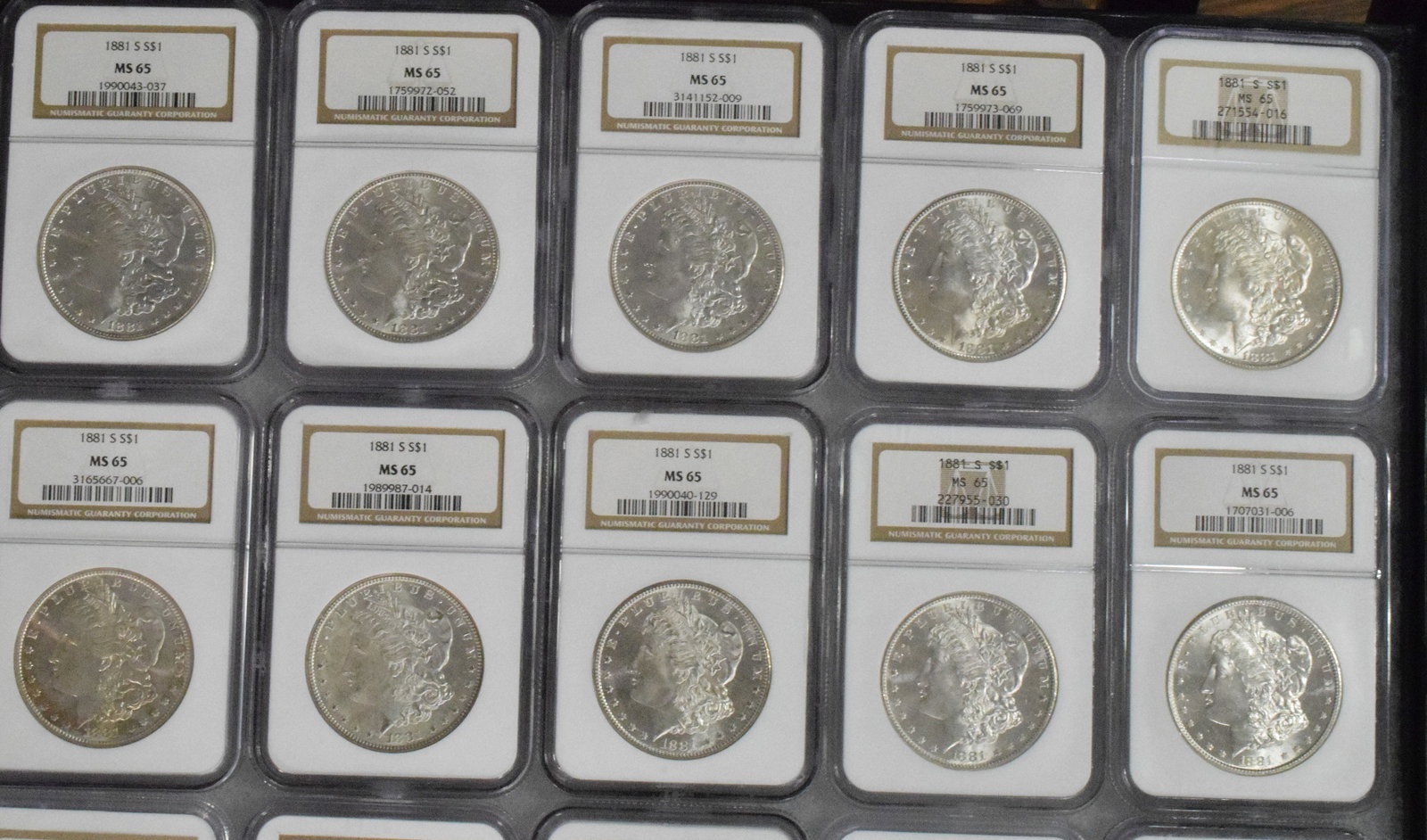 56 GRADED US SILVER MORGAN DOLLARS 1881s - 9