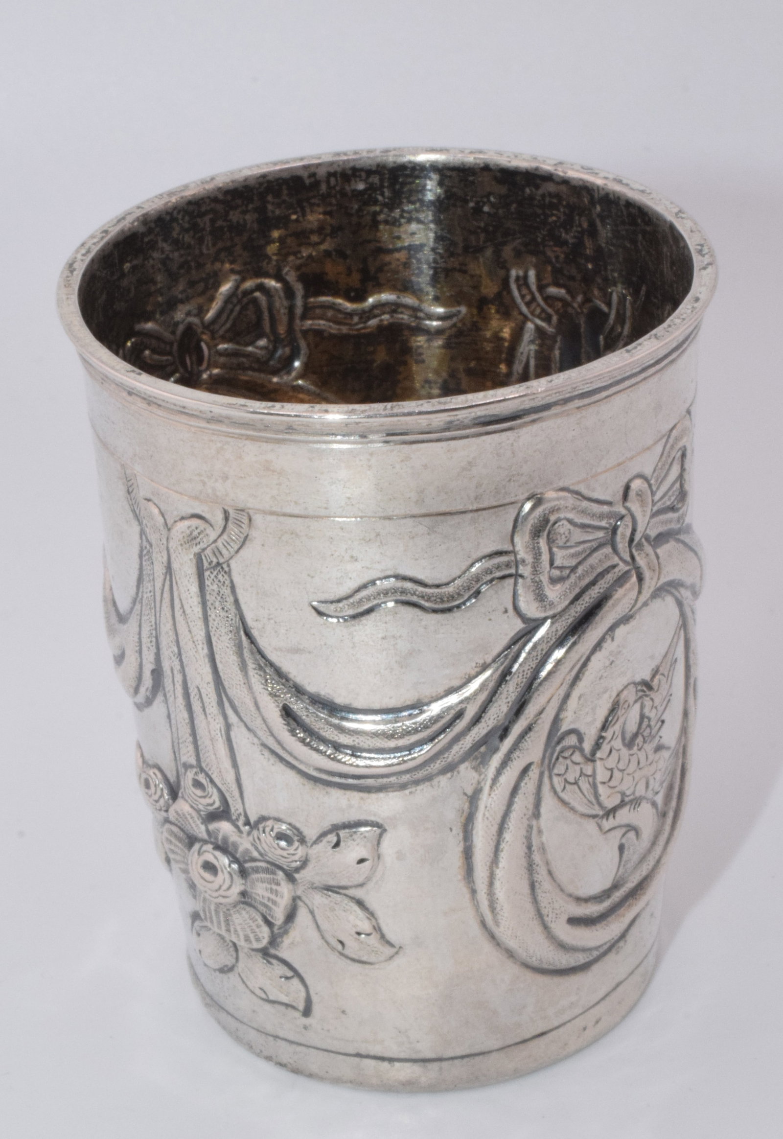 SILVER ALDERMAN ALEXEI KOSYREV RUSSIAN VODKA CUP: A 18th century Russian silver Vodka cup with early Russian hallmarks. Dated mark 1784. One stamped hallmark A.A K we believe for Aldermen Alexei Kosyrev. 3 inches tall x 2 3/8 inches