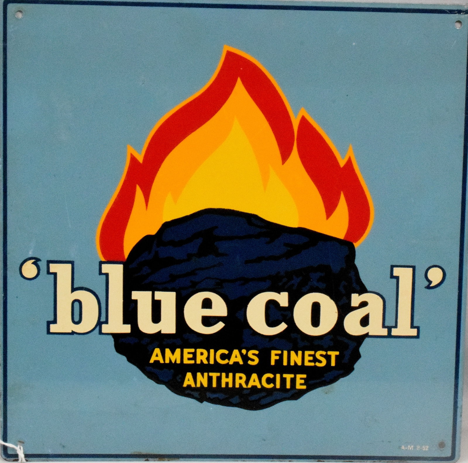 ENAMEL METAL BLUE COAL METAL SIGN: Enamel metal Blue Coal sign. One sided, blue background with white and yellow marked "Blue Coal America's Finest Anthracite", with image of coal and flames behind it. Sign has Makers Mark anddate