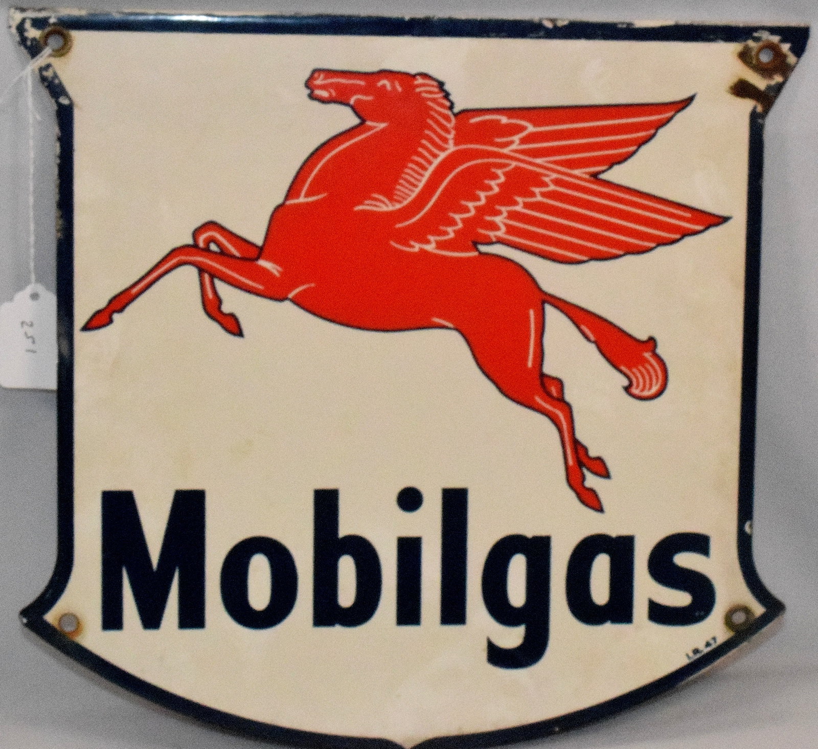 ENAMEL SSP MOBILGAS SHEILD SIGN: SSP one sided Mobilgas - shield sign, enamel sign. Good condition, 12 " x 12.25 ", marked I.R.47, the weight of the SSP Mobilgas - shield sign is 1 pound.