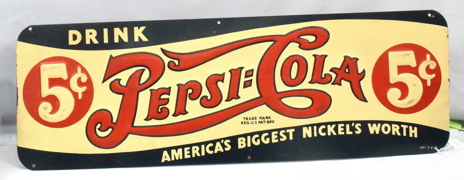 1939 PEPSI COLA AMERICA'S BIGGEST NICKEL'S WORTH: Embossed Pepsi Cola sign with embossed 5 cent signs. Displays very well, 10 " x 30 ". Original with minor scuffs, scratches, rust spotting, the weight for the Pepsi Cola America's biggestNickel's
