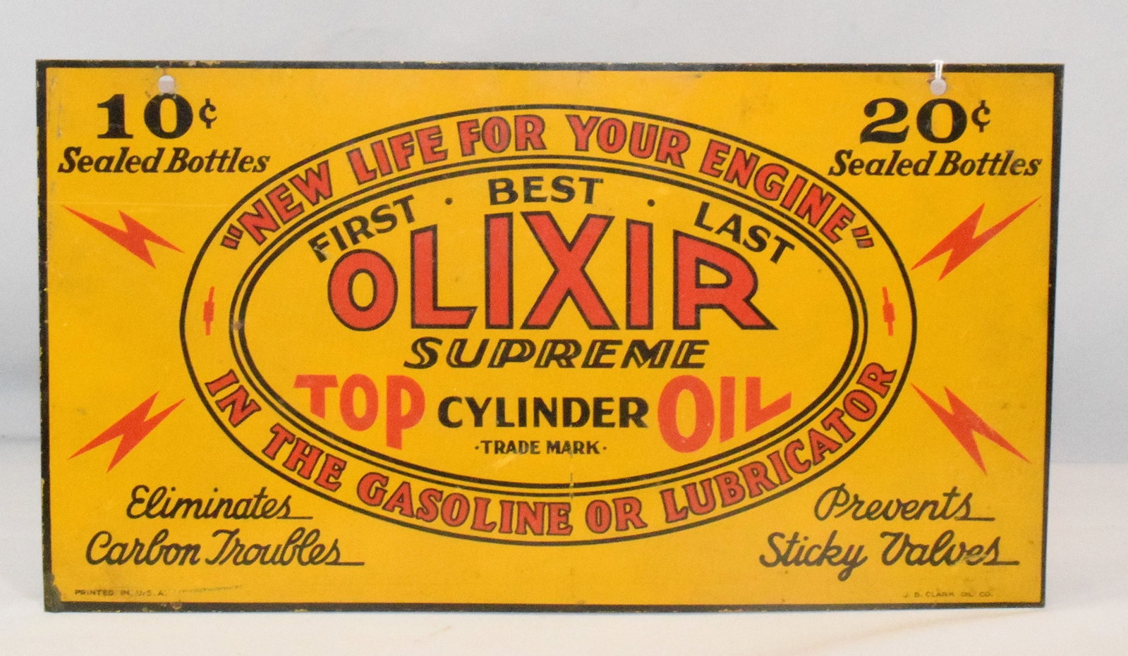 OLIVER SUPREME CYLINDER OIL TIN SIGN: Oliver Supreme Cylinder Oil Tin Sign, the sign shows bright color and gloss throughout, only tiny amounts of damage around the corners of the sign, other than that good condition, 16 " x 8 - 3/4 ".