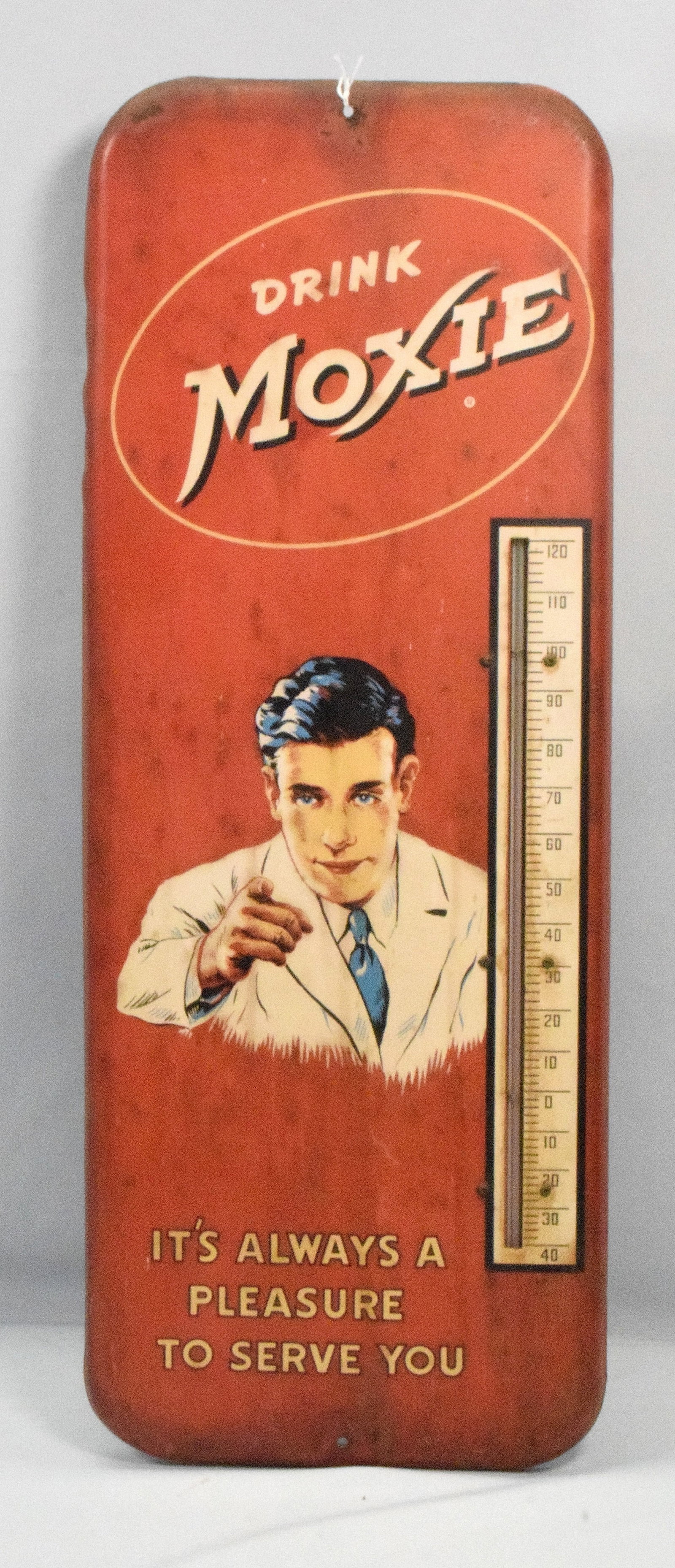 MOXIE "ALWAYS A PLEASURE TO SERVE YOU" THERMOMETER: SST thermometer has moderate color and shine. The tube is intact and works as it should. The field has a general wear throughout the thermometer, 25.5 " x 9.75 ", the weight of the Drink Moxie