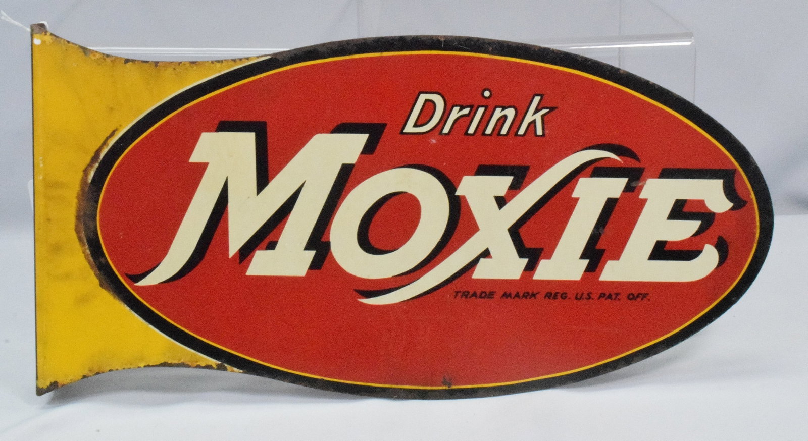 MOXIE FLANGE SIGN: Drink Moxie metal sign. Red and yellow, double sided. Some rust around edges, good condition.18in x 9 in. 1 lbs.