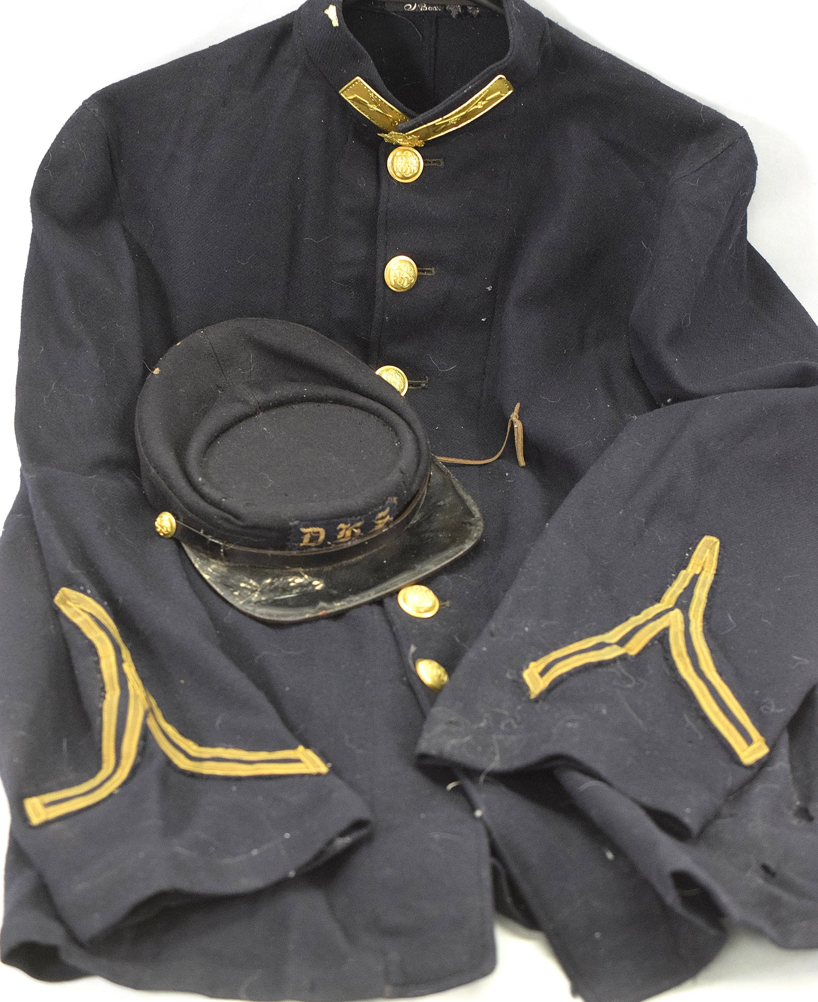 POST CIVIL WAR BOSTON SCHOOL CADDETS UNIFORM & HAT: Post Civil-War Boston school cadets uniform and kepi, Has some damage from moths on collar and right side toward bottom also with moth damage. Some damage to kepi, Medium sized jacket and hasbadges ar