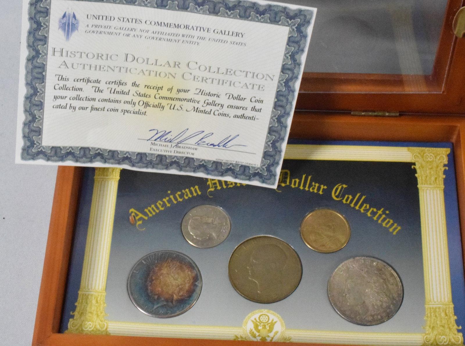 ASSORTED COMMEMORATIVE COINS: Consists of 1) Green Album First & Last U.S. Coins. Holiday Postal Commemorative Society coin set. 2) With COA. American Historic Dollar Collection coin Set. In case. 3) Blue folder. USFine Art Commem