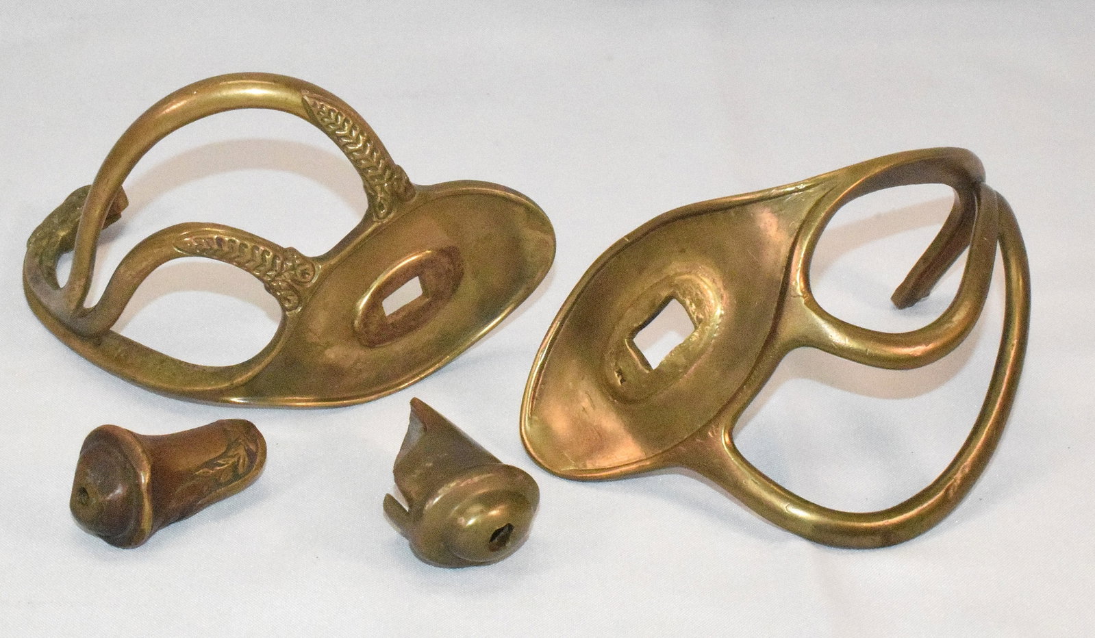 TWO BRASS 1840'S MODELED CAVALRY SWORD GUARDS/CAPS (1 of 5)